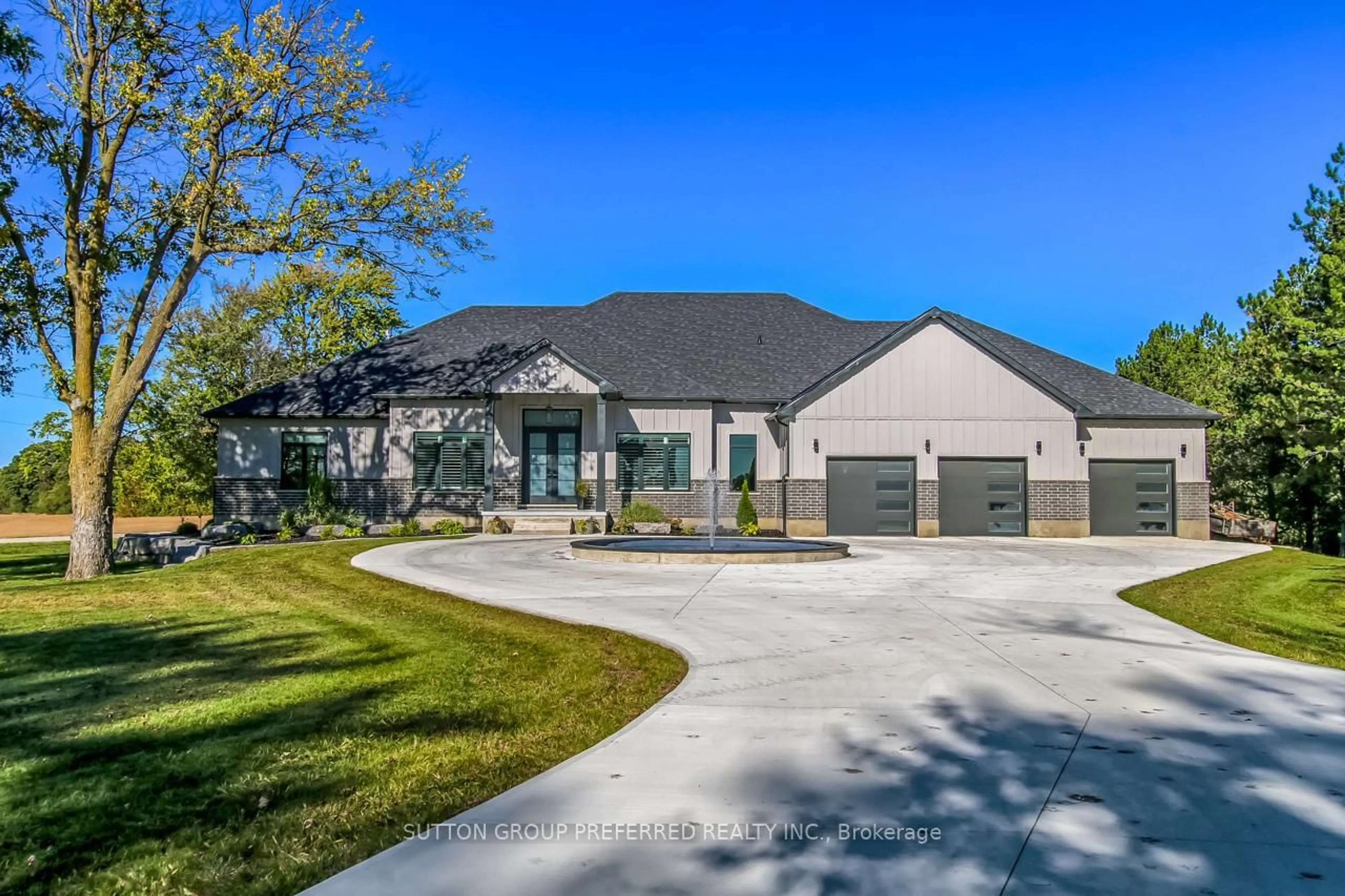 Home with brick exterior material, street for 25770 Poplar Hill Rd, Middlesex Centre Ontario N0M 1P0