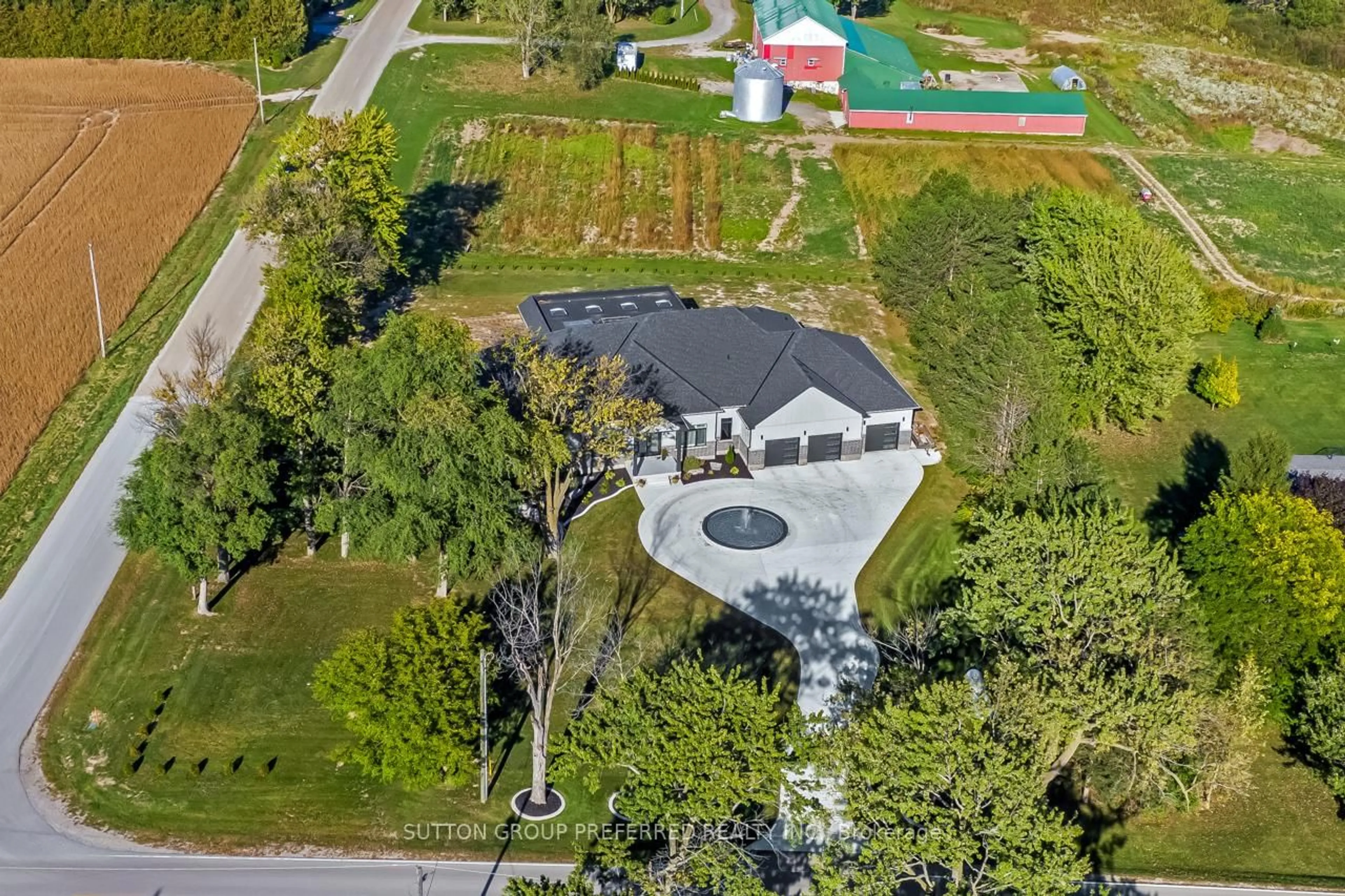 A pic from outside/outdoor area/front of a property/back of a property/a pic from drone, unknown for 25770 Poplar Hill Rd, Middlesex Centre Ontario N0M 1P0