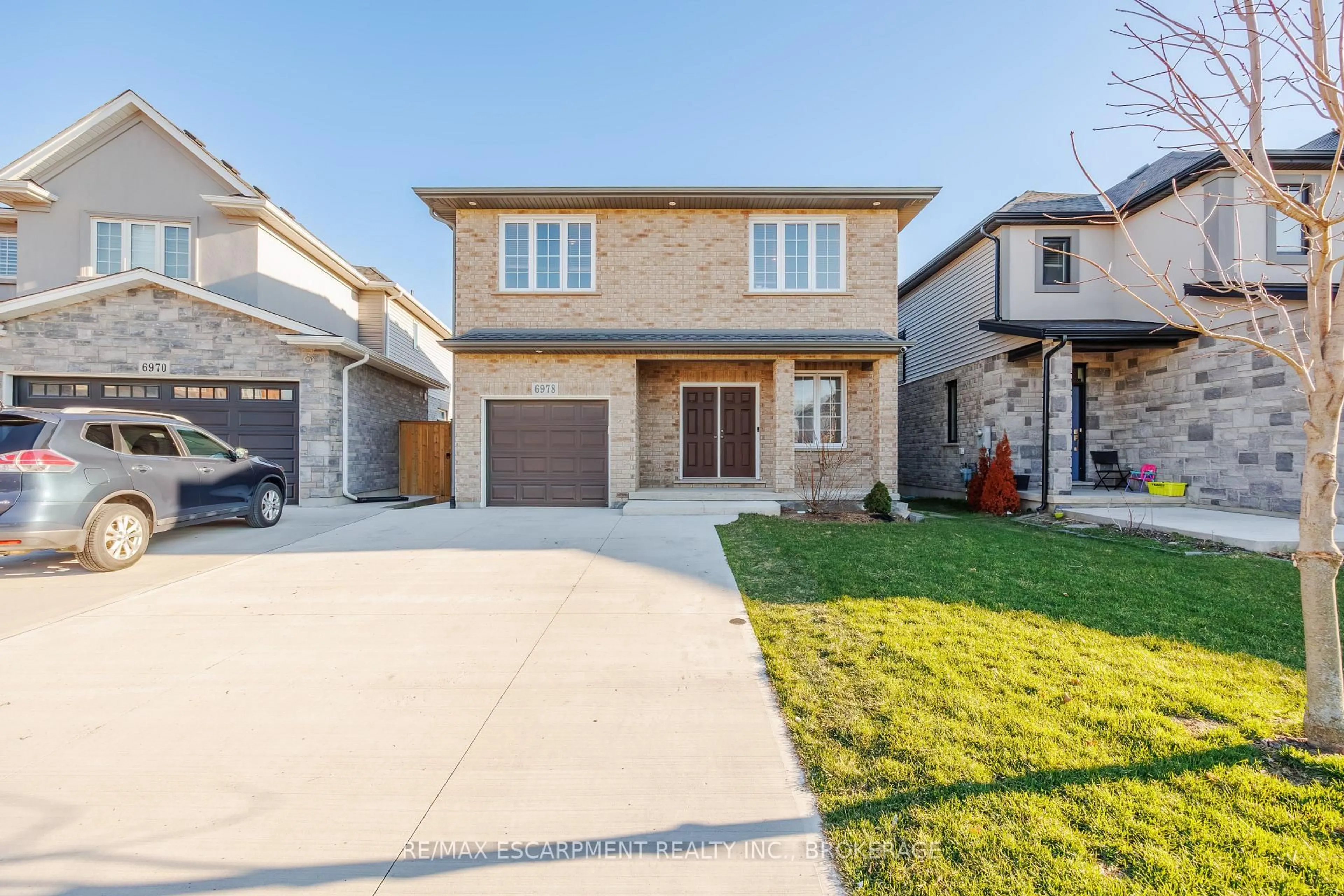 Home with brick exterior material, street for 6978 Optimist Lane, Niagara Falls Ontario L2E 0B1