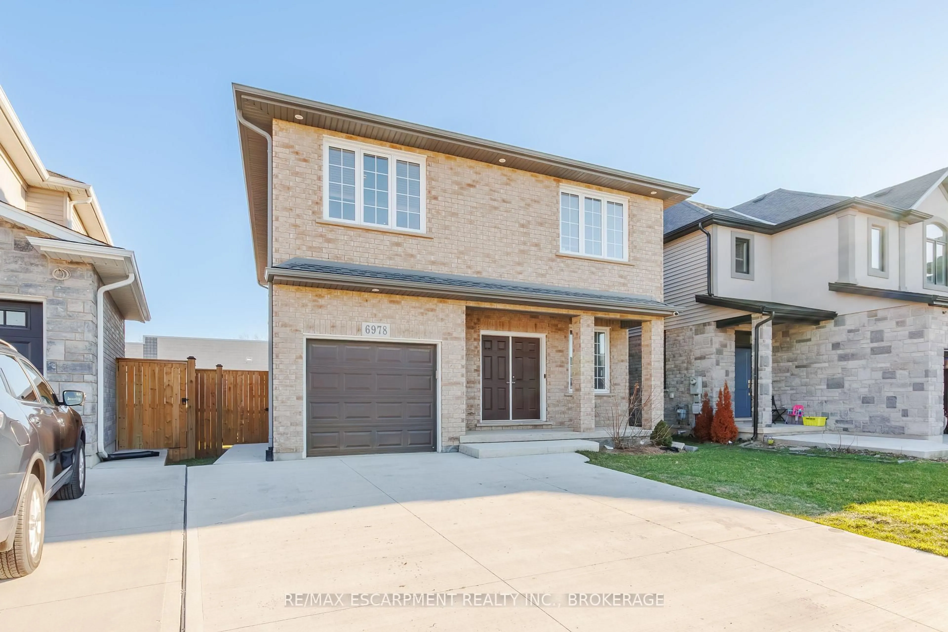 Home with brick exterior material, street for 6978 Optimist Lane, Niagara Falls Ontario L2E 0B1