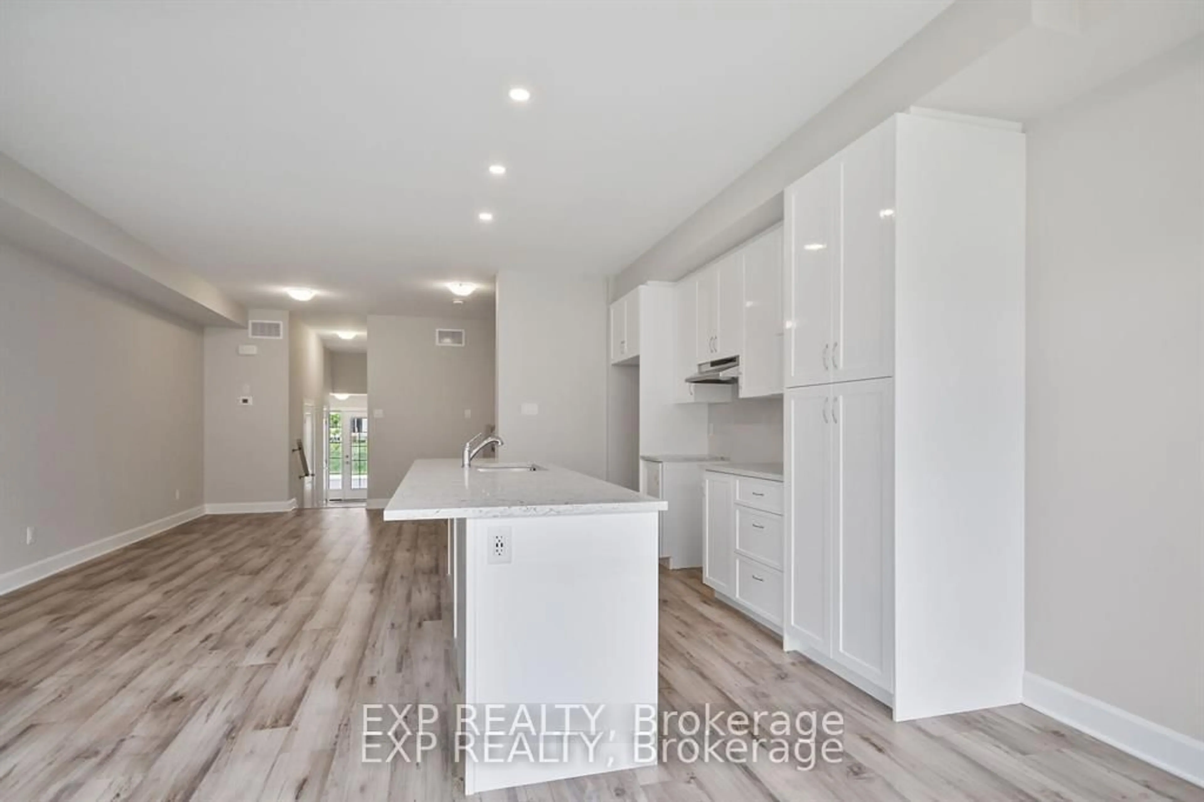 Open concept kitchen, wood/laminate floor for 18 REYNOLDS Ave, Carleton Place Ontario K7C 0C4