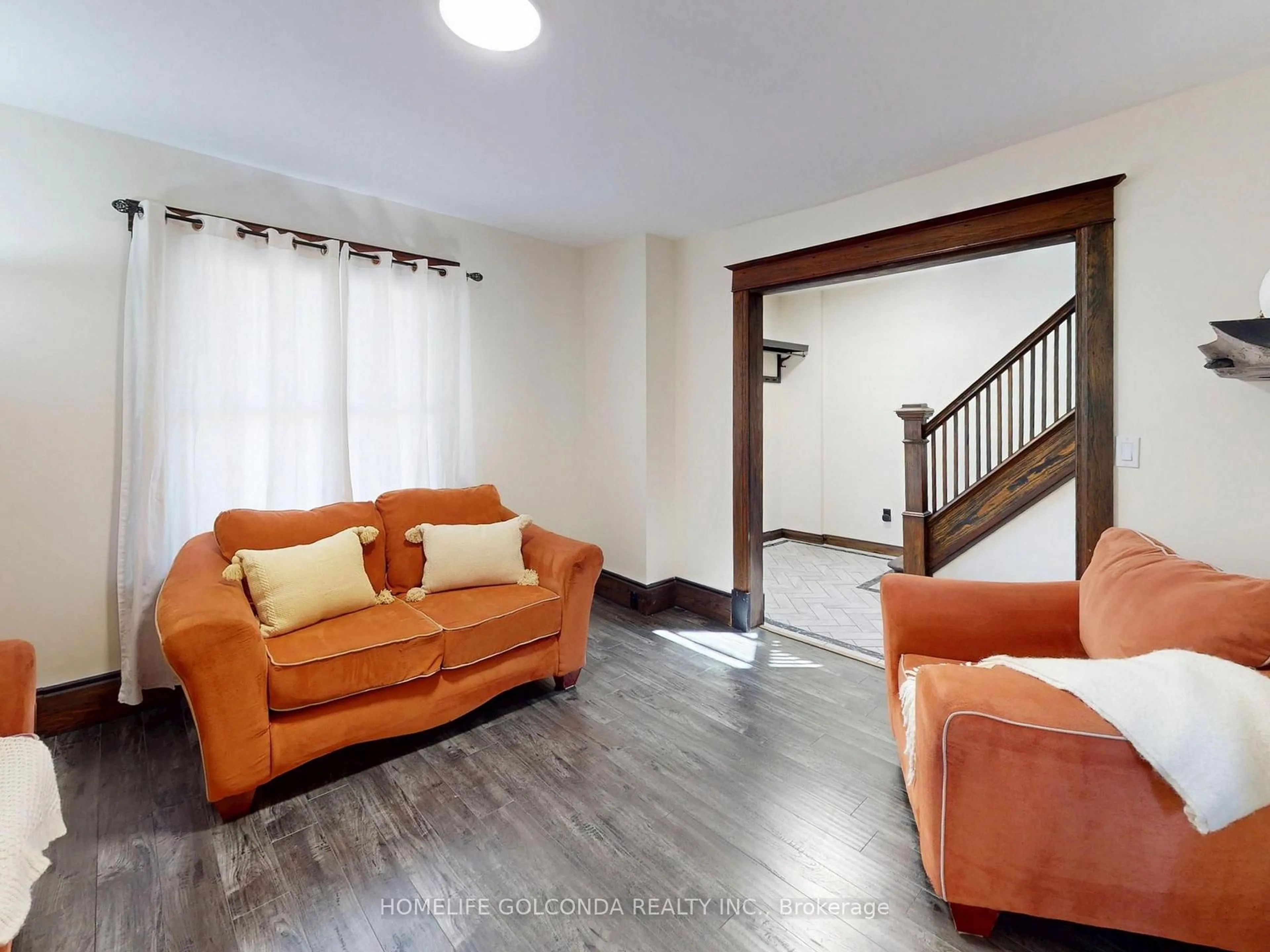 Living room with furniture, unknown for 27 Woodland Ave, St. Catharines Ontario L2R 5A1