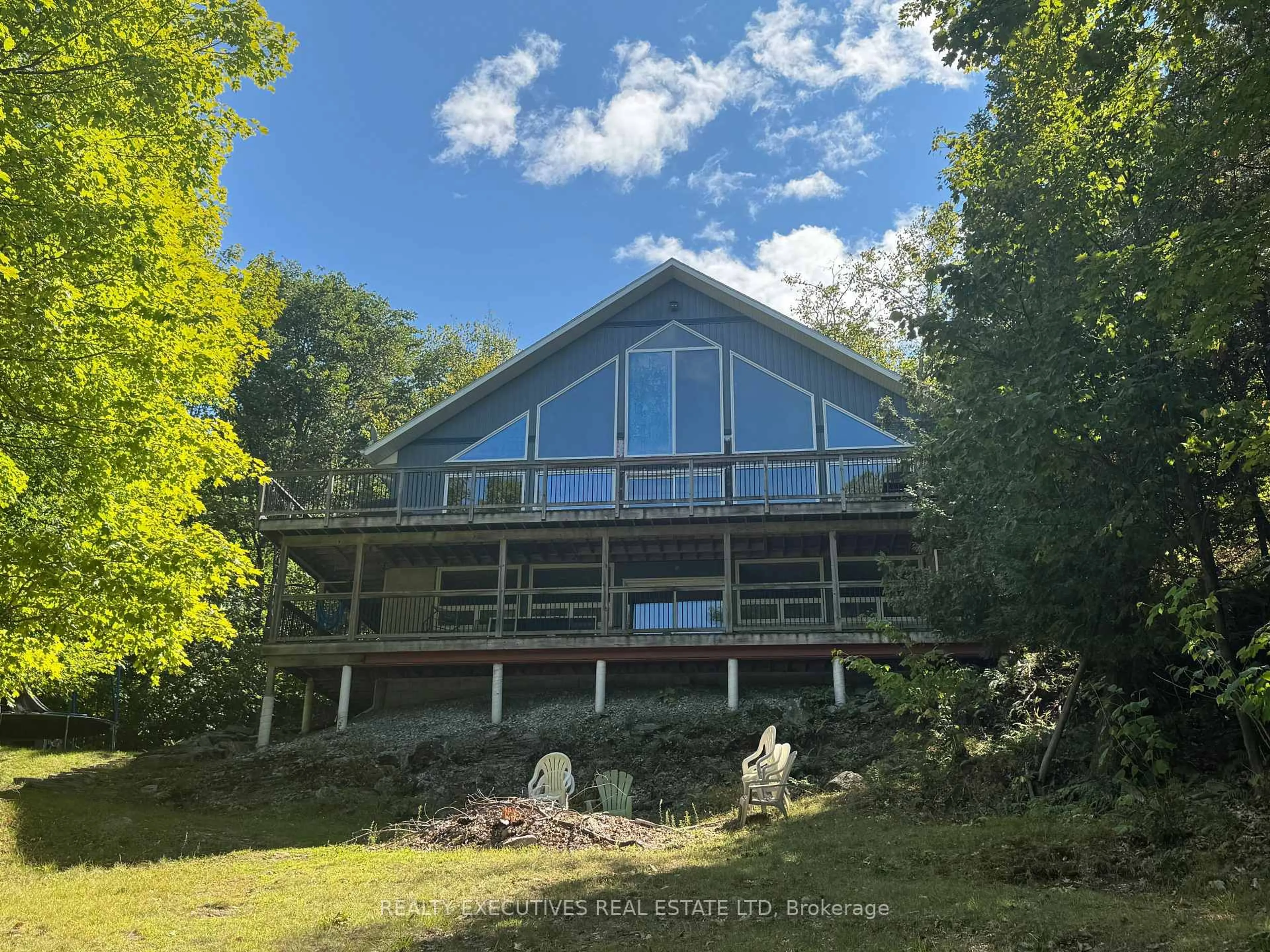 A pic from outside/outdoor area/front of a property/back of a property/a pic from drone, water/lake/river/ocean view for 3A Whippoorwill Lane, Westport Ontario K0G 1X0