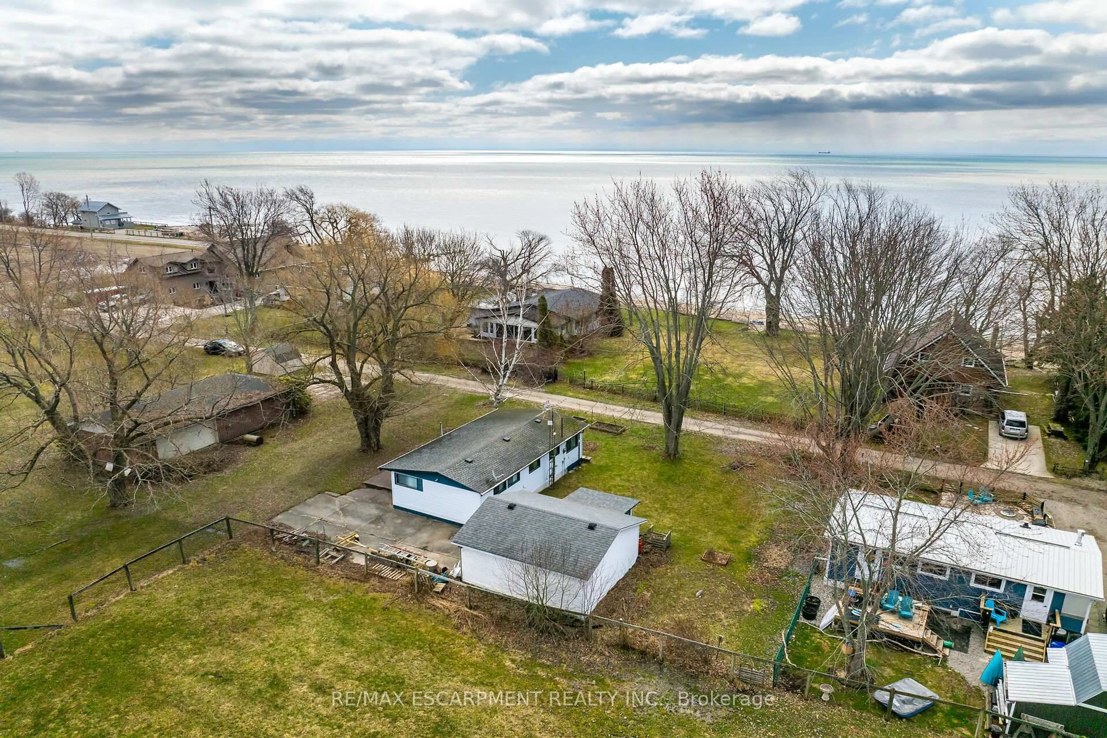 A pic from outside/outdoor area/front of a property/back of a property/a pic from drone, water/lake/river/ocean view for 10 Anchor Lane, Haldimand Ontario N0A 1P0