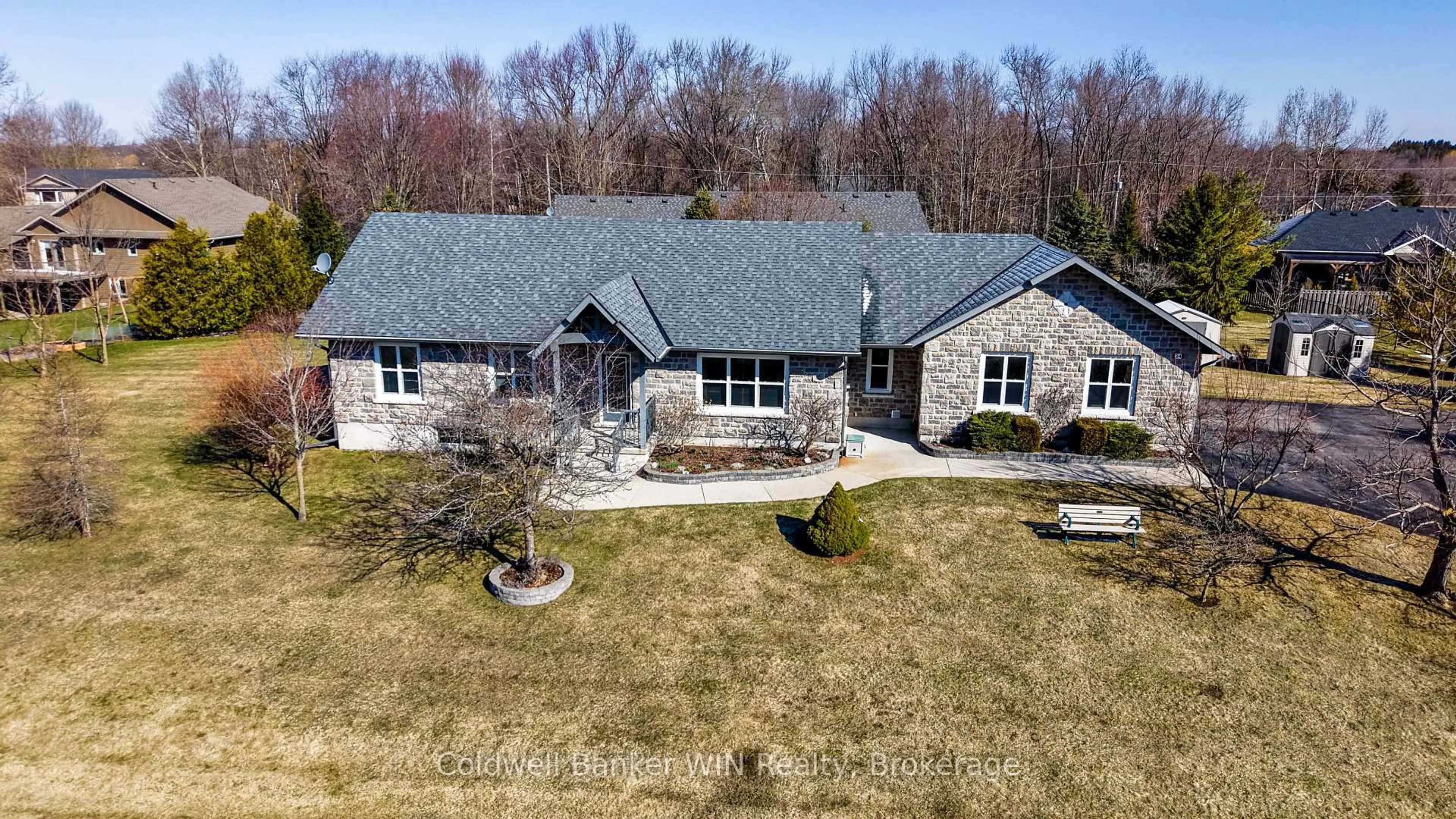 A pic from outside/outdoor area/front of a property/back of a property/a pic from drone, street for 34 Regency Dr, Minto Ontario N0G 1M0