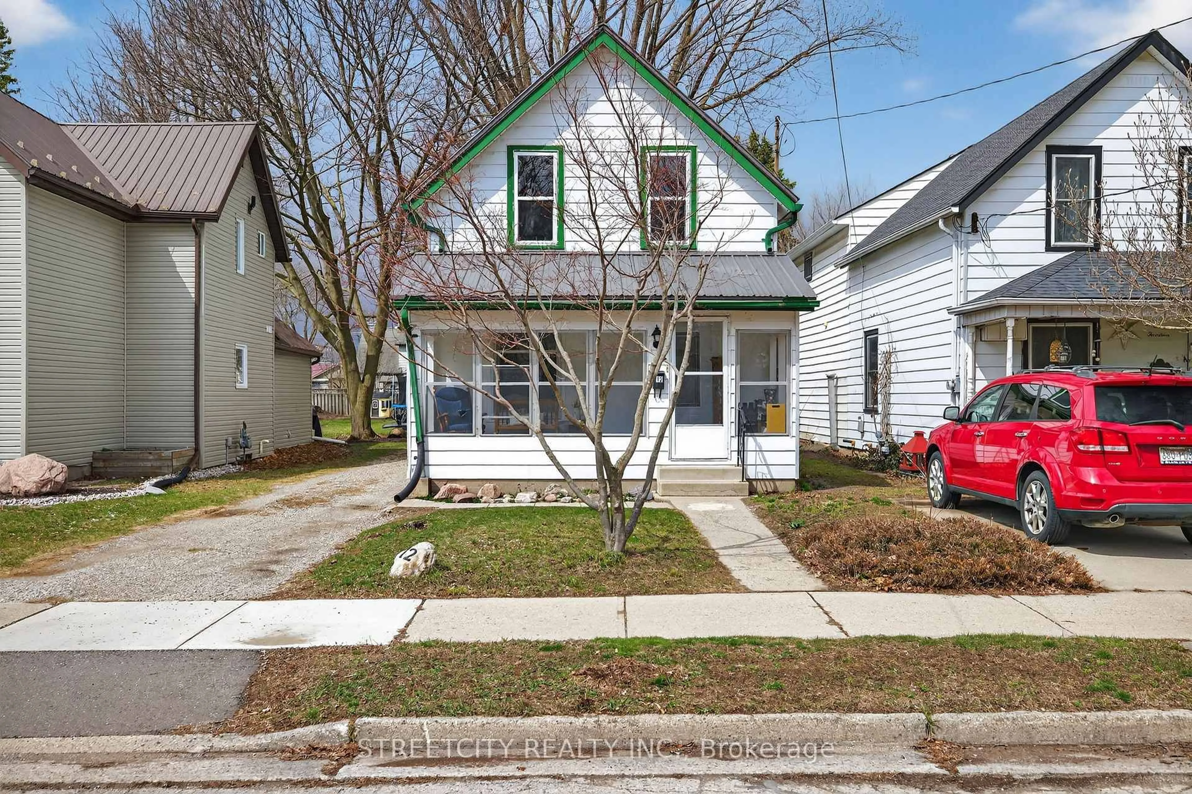Home with vinyl exterior material, street for 12 Pearl St, Tillsonburg Ontario N4G 1L3