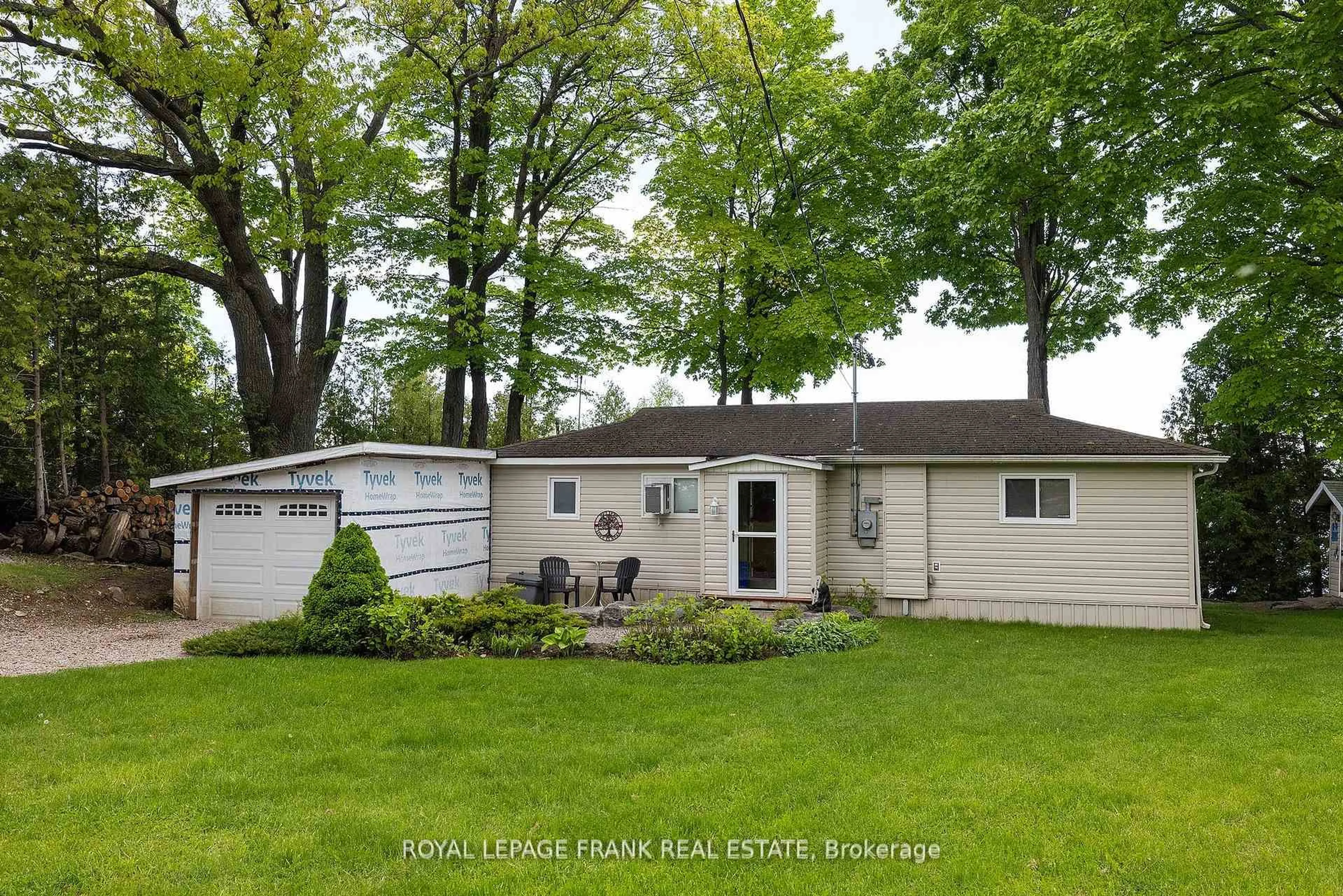 Home with vinyl exterior material, street for 26 Fire Route 60, Trent Lakes Ontario K0L 1J0