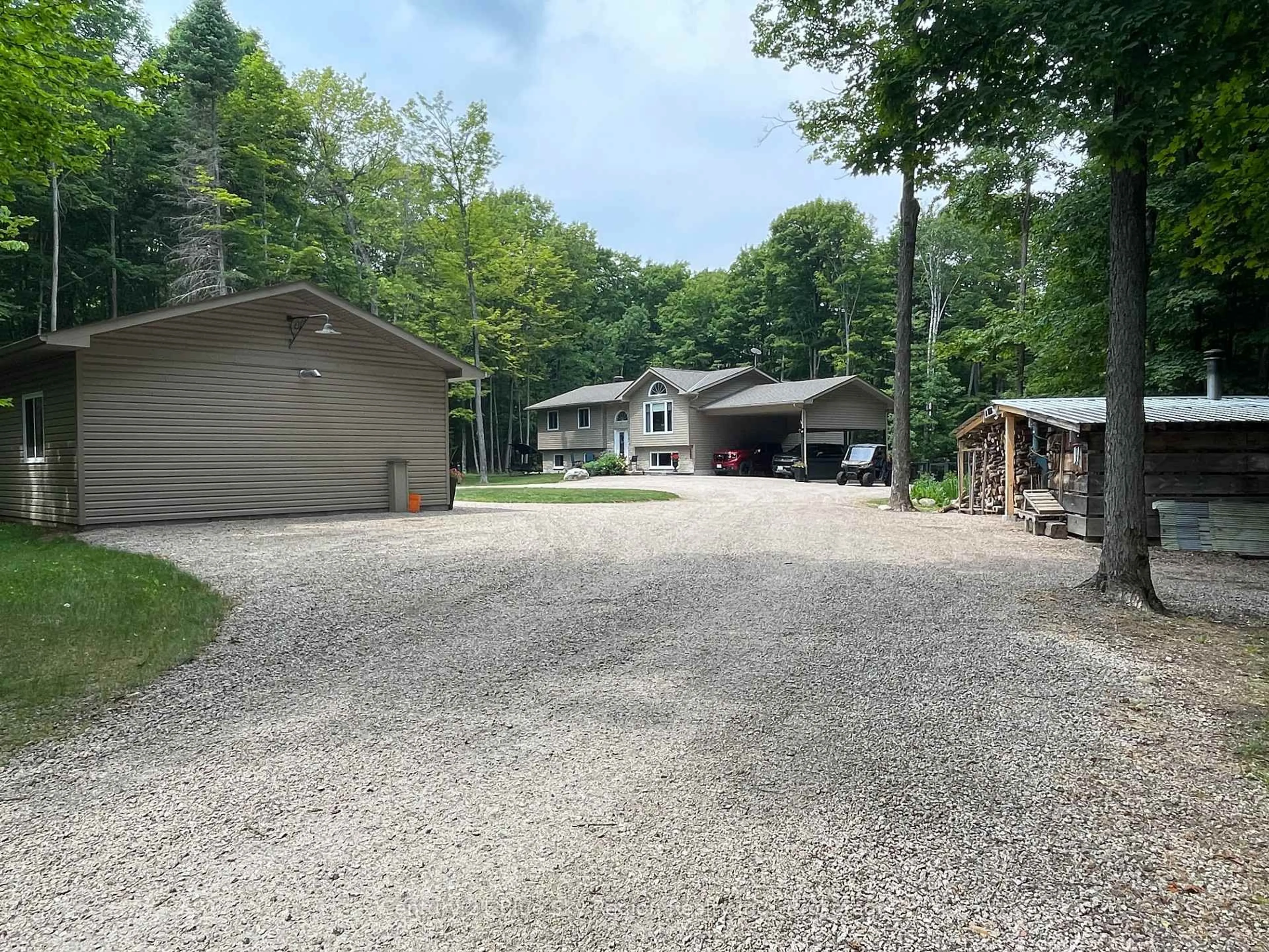 A pic from outside/outdoor area/front of a property/back of a property/a pic from drone, unknown for 176 SKI HILL Rd, Powassan Ontario P0H 1Z0