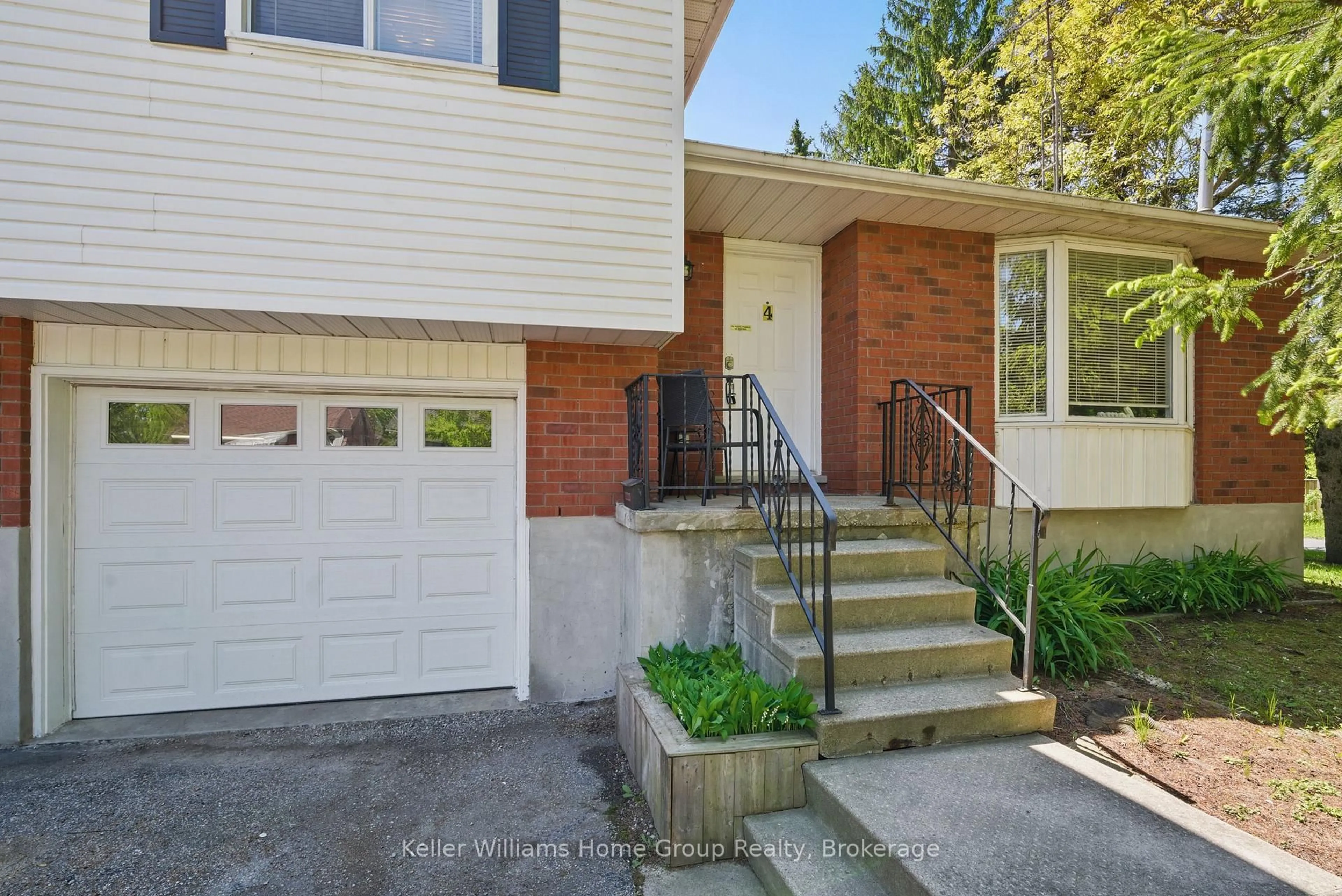 Home with brick exterior material, street for 4 Market St, Kitchener Ontario N2K 1H2