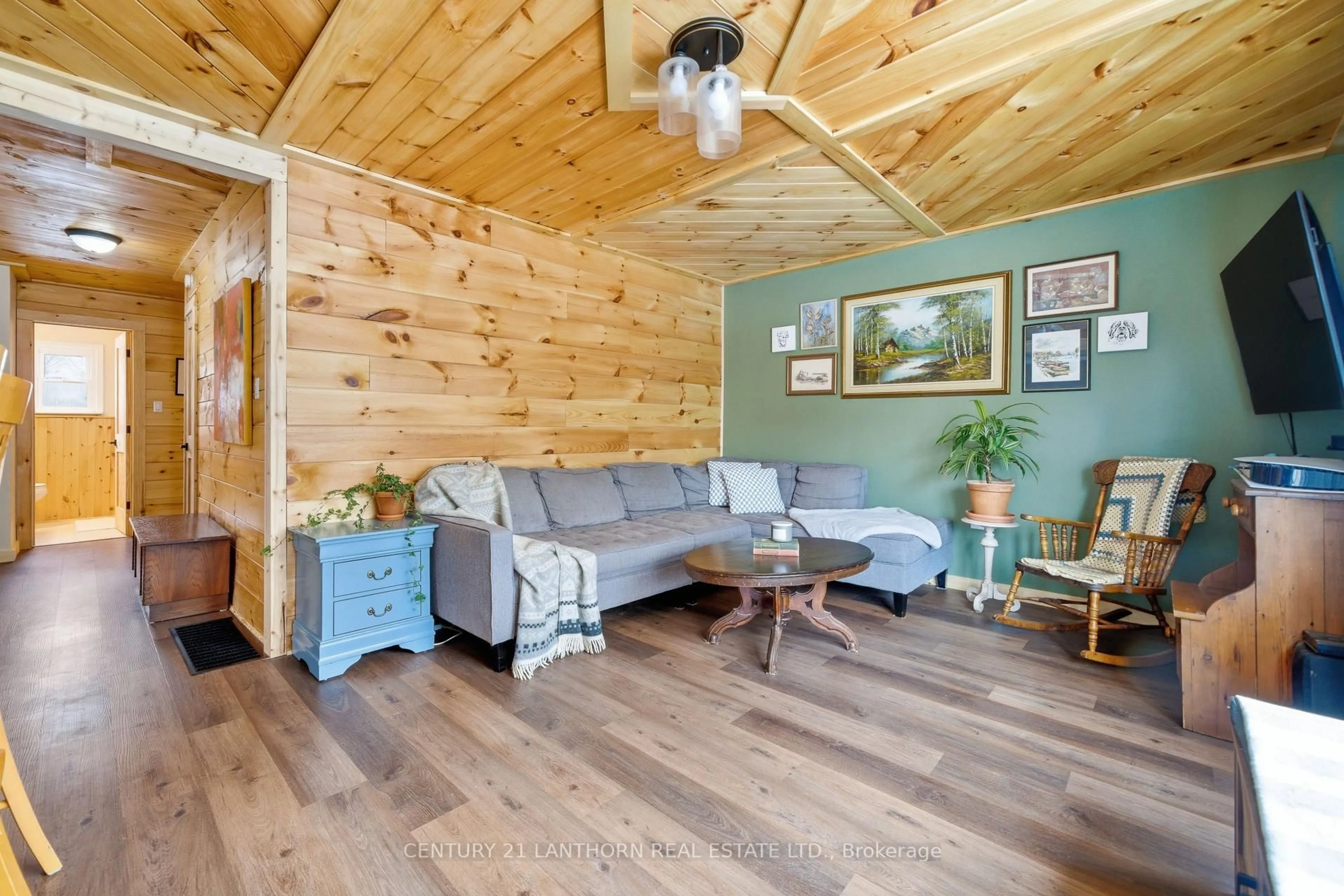 Living room with furniture, wood/laminate floor for 2 Duncan St, Prince Edward County Ontario K0K 1T0