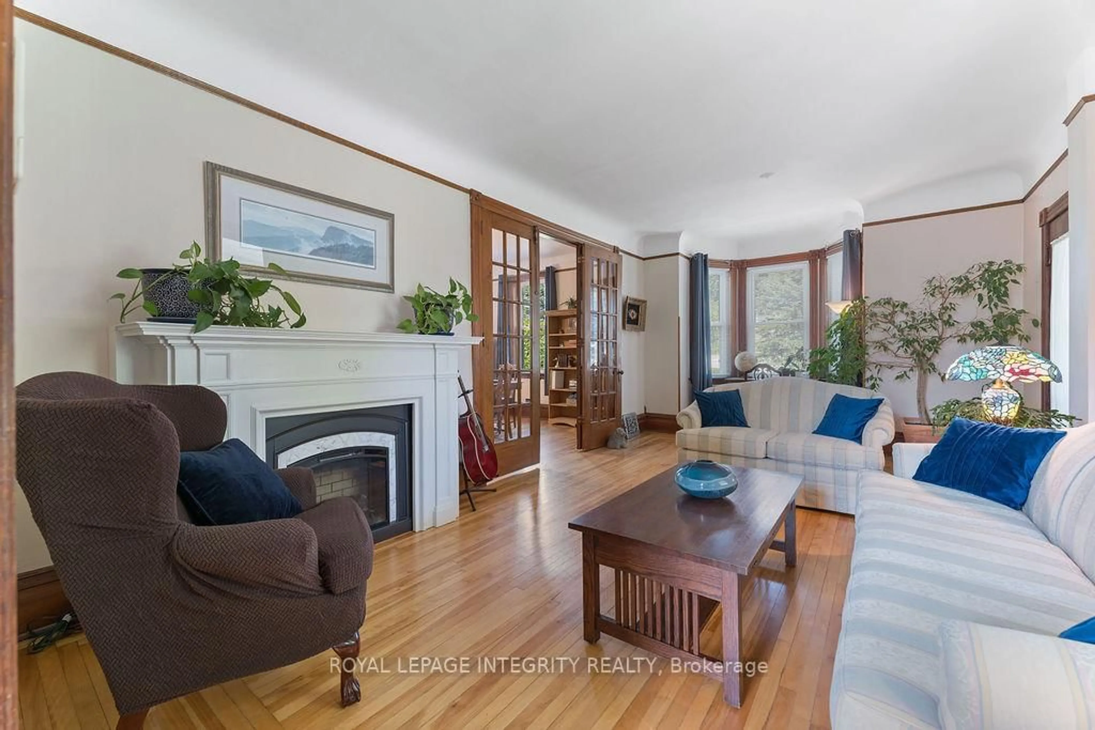 Living room with furniture, wood/laminate floor for 72 Lakeshore Dr, South Dundas Ontario K0C 1X0