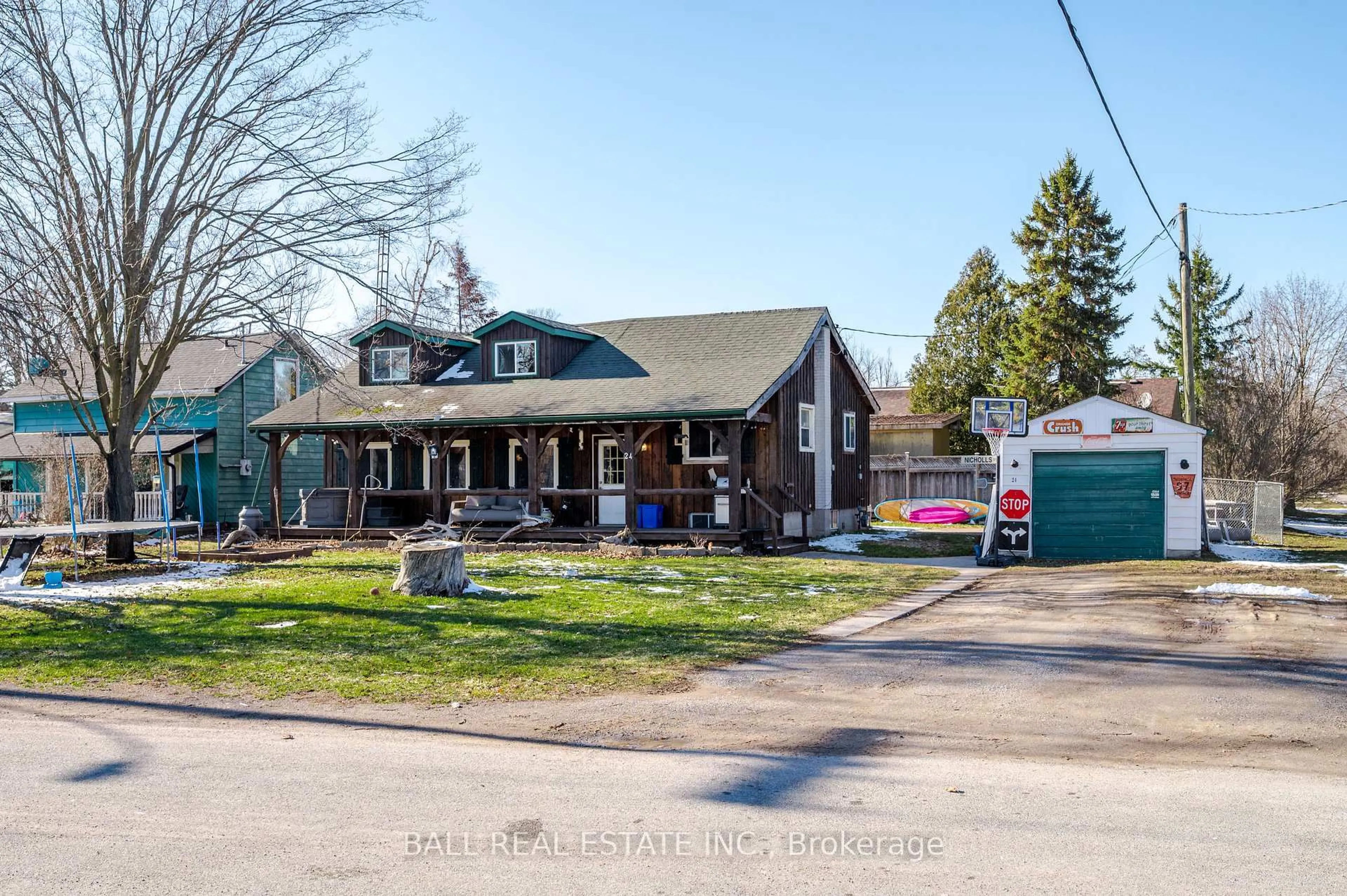 A pic from outside/outdoor area/front of a property/back of a property/a pic from drone, street for 24 Nicholls St, Selwyn Ontario K0L 2H0