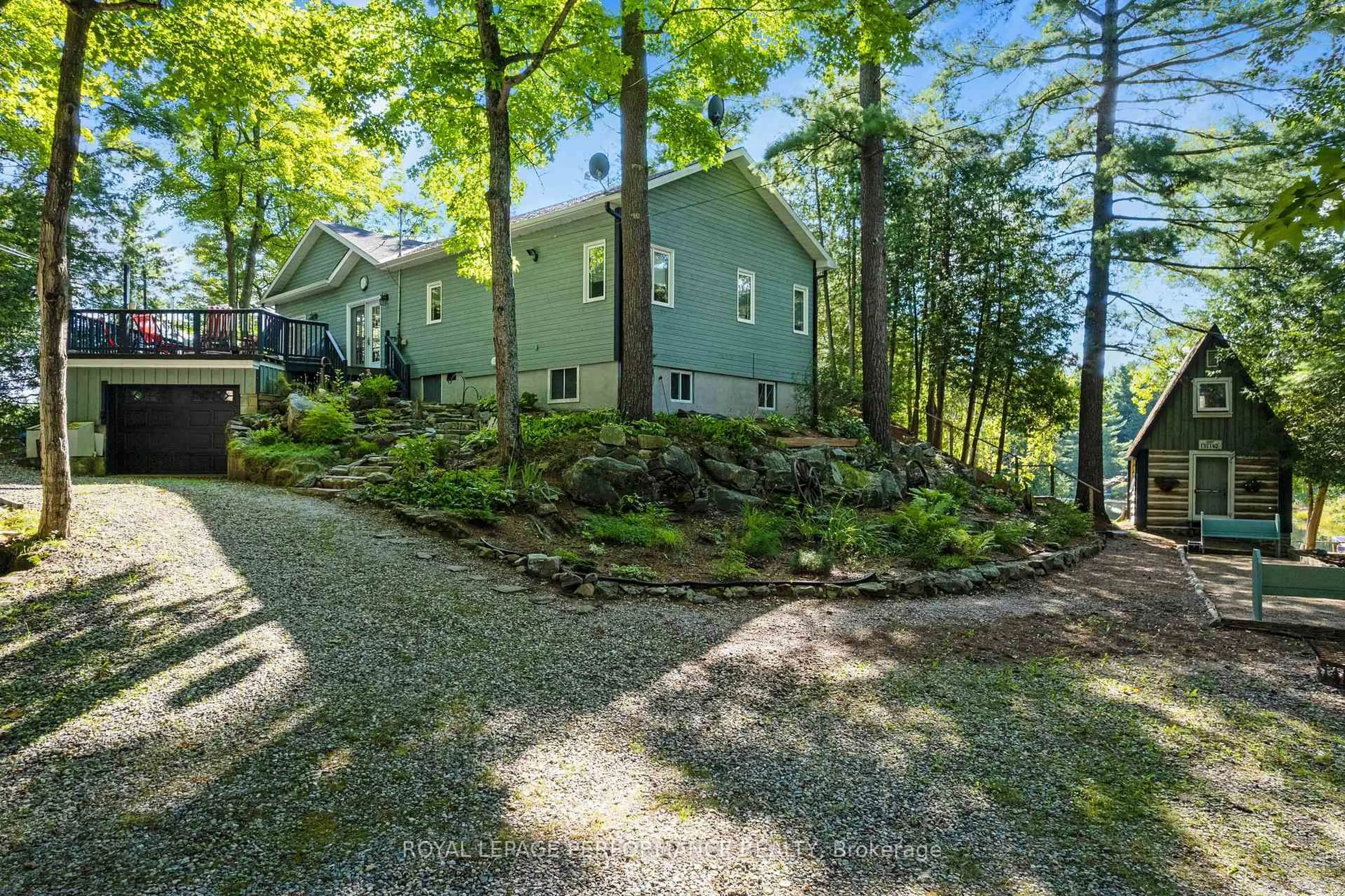A pic from outside/outdoor area/front of a property/back of a property/a pic from drone, forest/trees view for 1020 Carson Trail Rd, Snow Road Station Ontario K0H 2R0