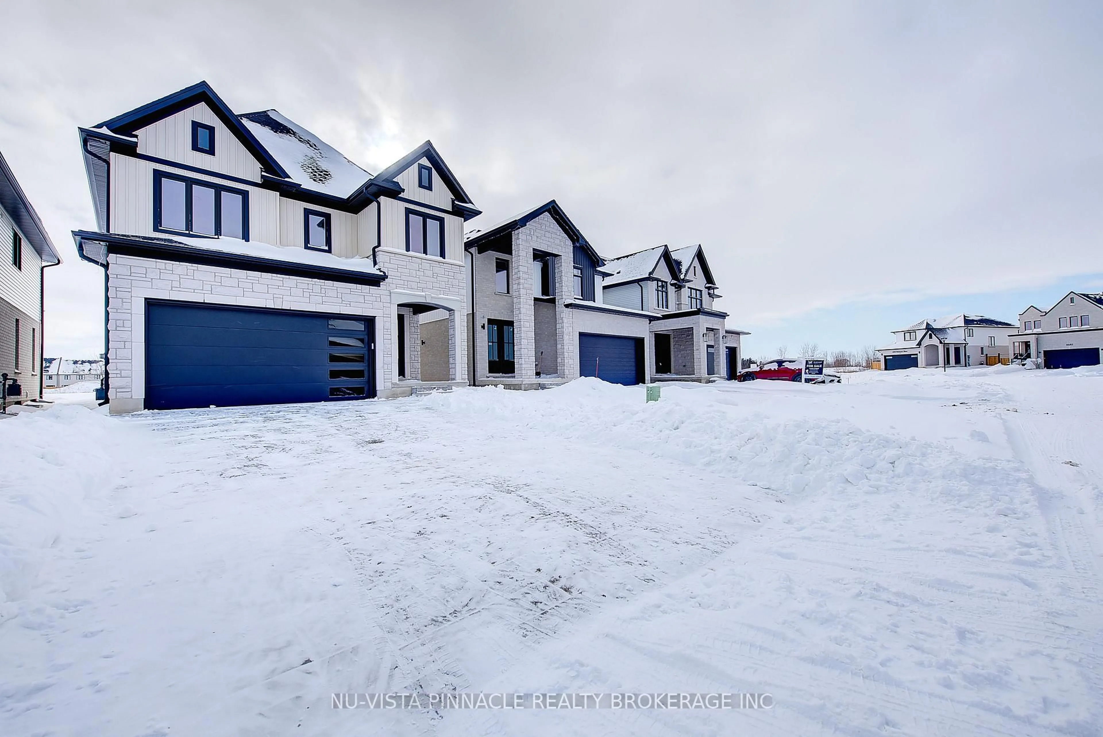 A pic from outside/outdoor area/front of a property/back of a property/a pic from drone, street for 2628 Heardcreek Ave, London North Ontario N6G 0Z8