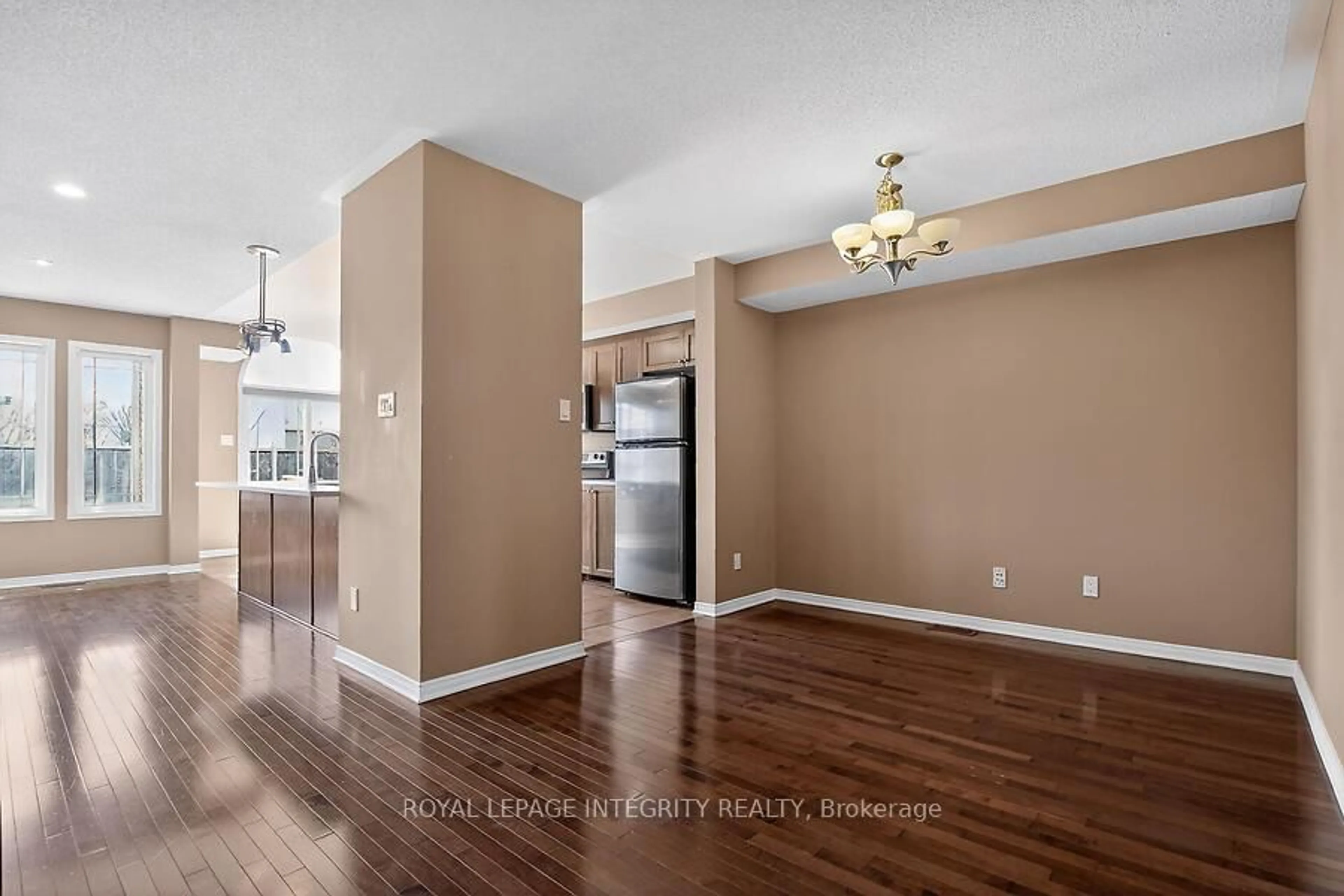 Open concept kitchen, wood/laminate floor for 672 Pepperville Cres, Ottawa Ontario K2M 0E4