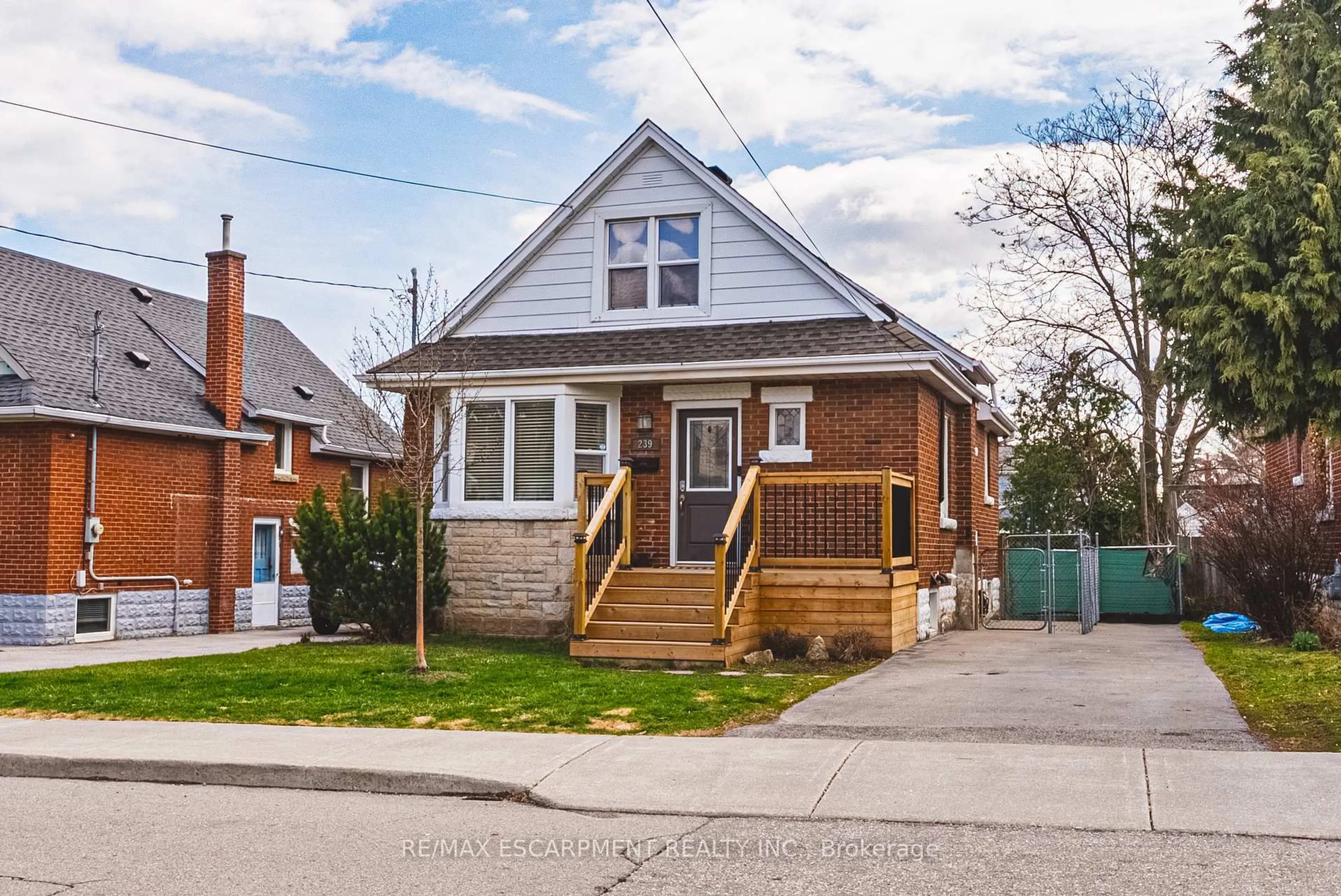 Home with brick exterior material, street for 239 Rosewood Rd, Hamilton Ontario L8K 3J5