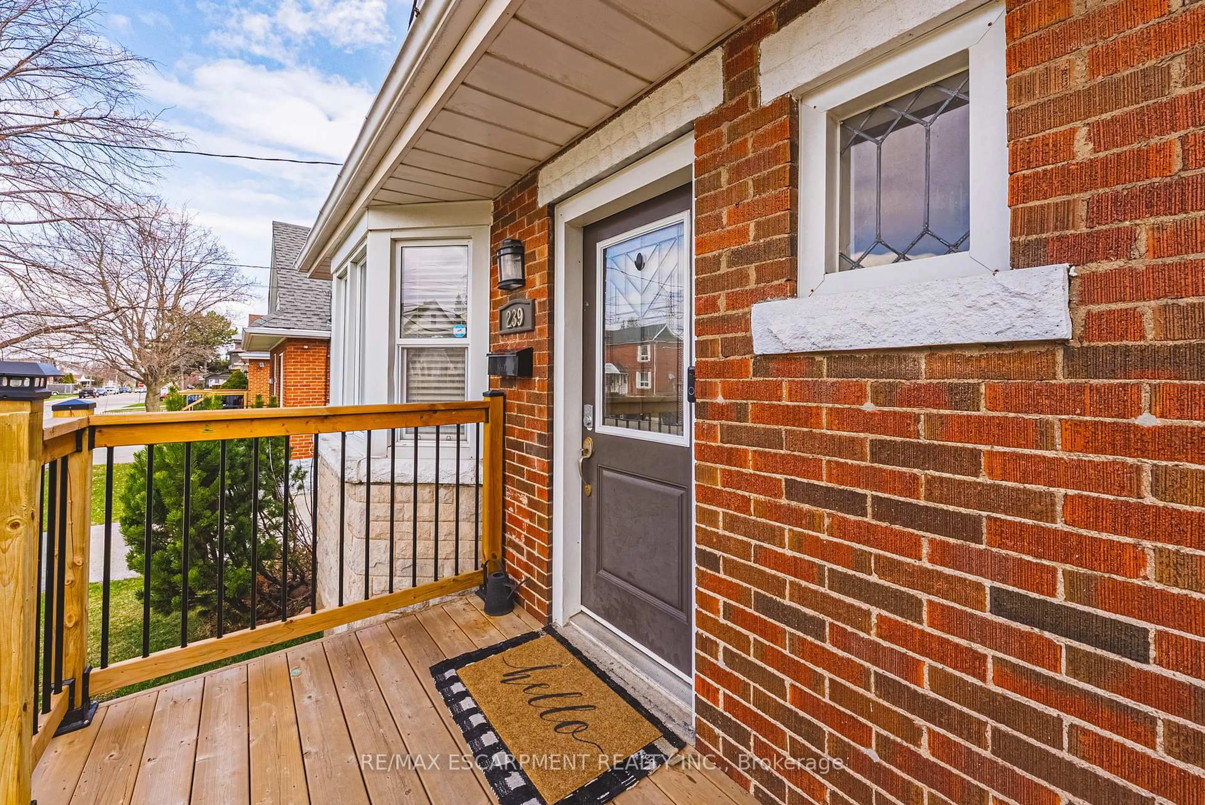 Home with brick exterior material, street for 239 Rosewood Rd, Hamilton Ontario L8K 3J5