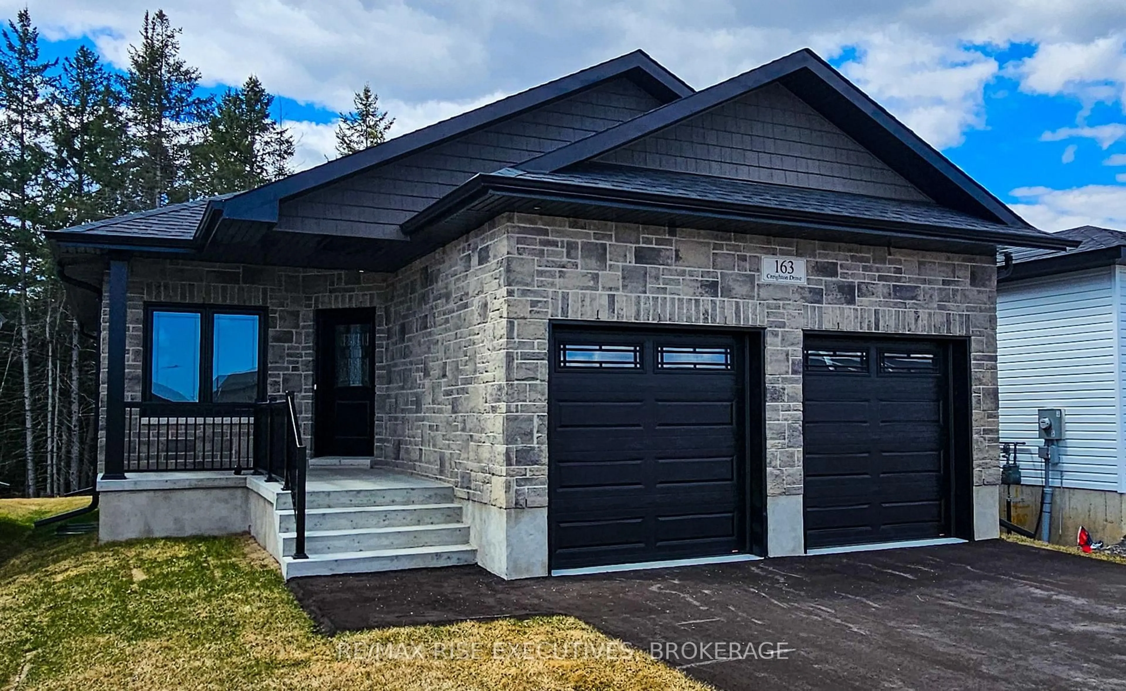 Home with brick exterior material, street for 171 Creighton Dr, Bissett Creek Ontario K0H 2H0