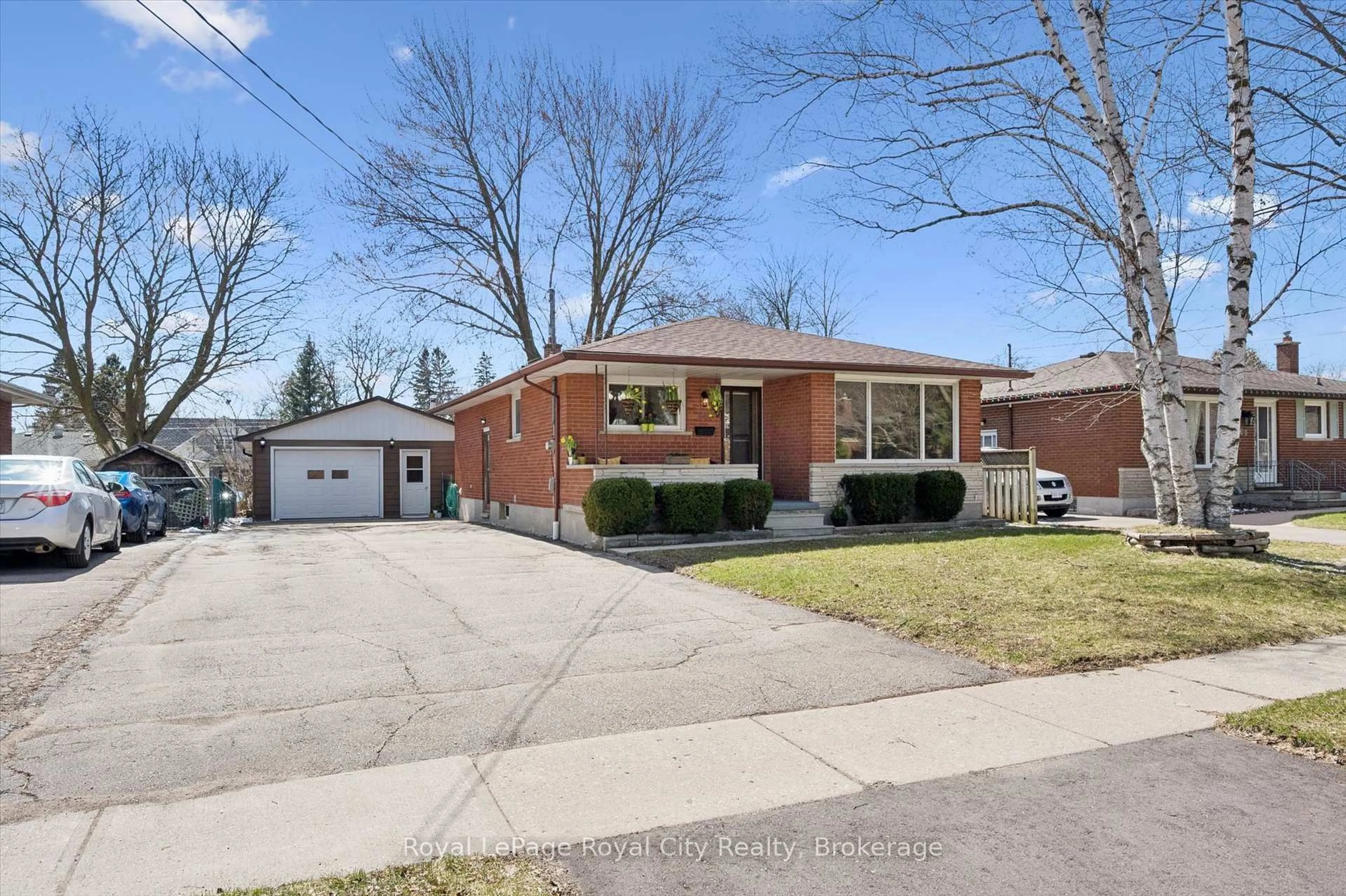 Home with brick exterior material, street for 16 Kenwood Cres, Guelph Ontario N1H 6E5