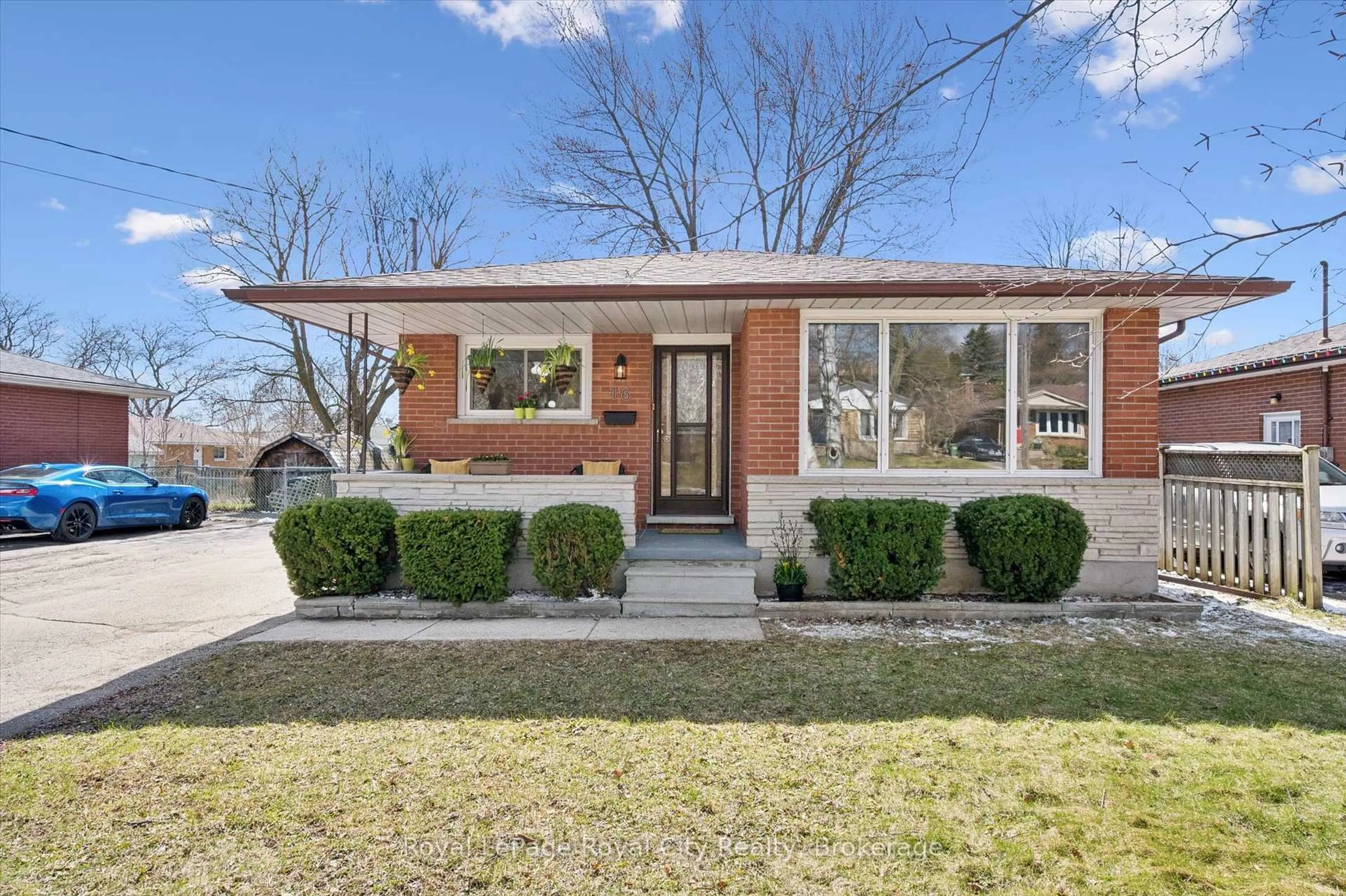 Home with brick exterior material, street for 16 Kenwood Cres, Guelph Ontario N1H 6E5