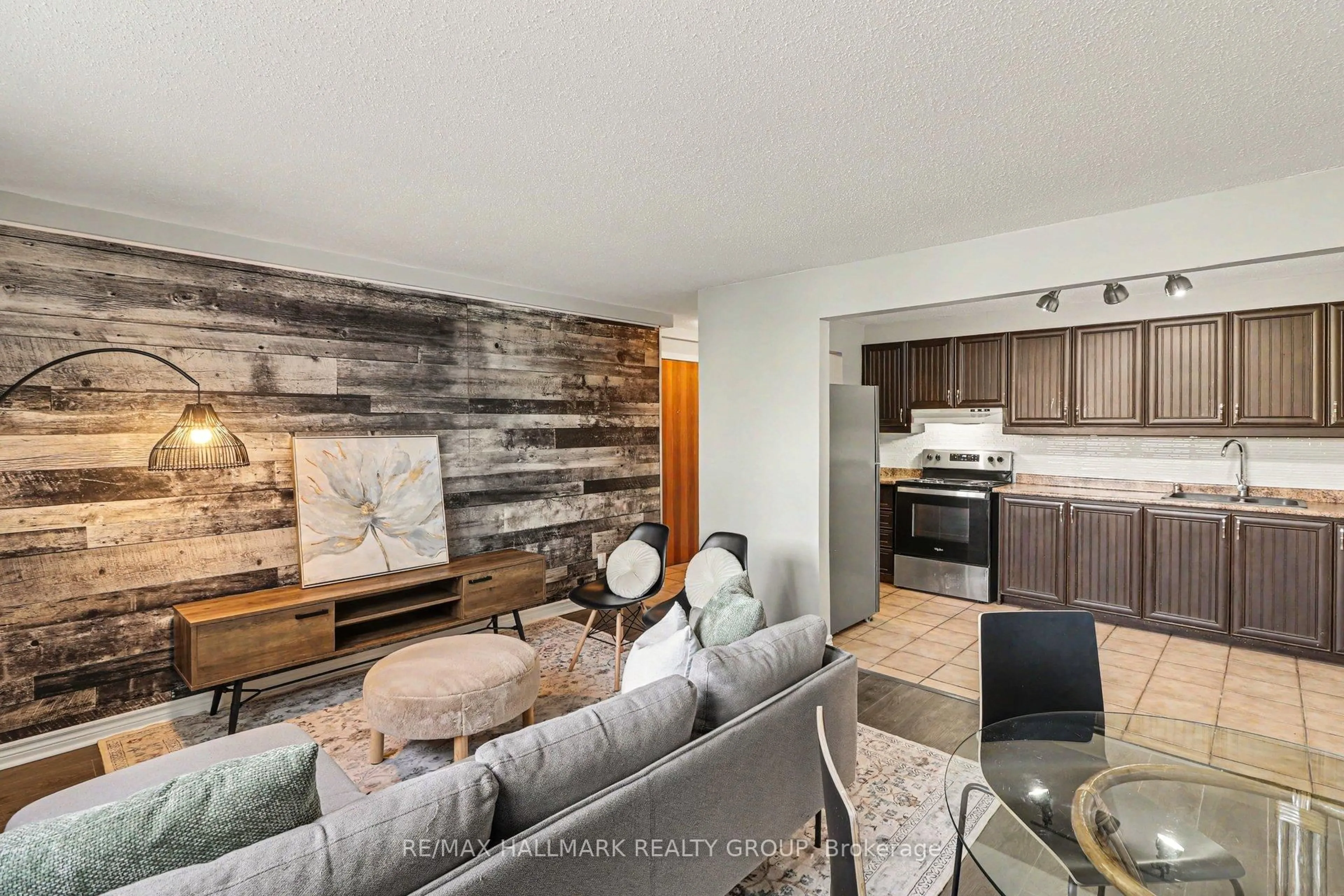 Open concept kitchen, wood/laminate floor for 898 Elmsmere Rd #2, Ottawa Ontario K1J 7T6