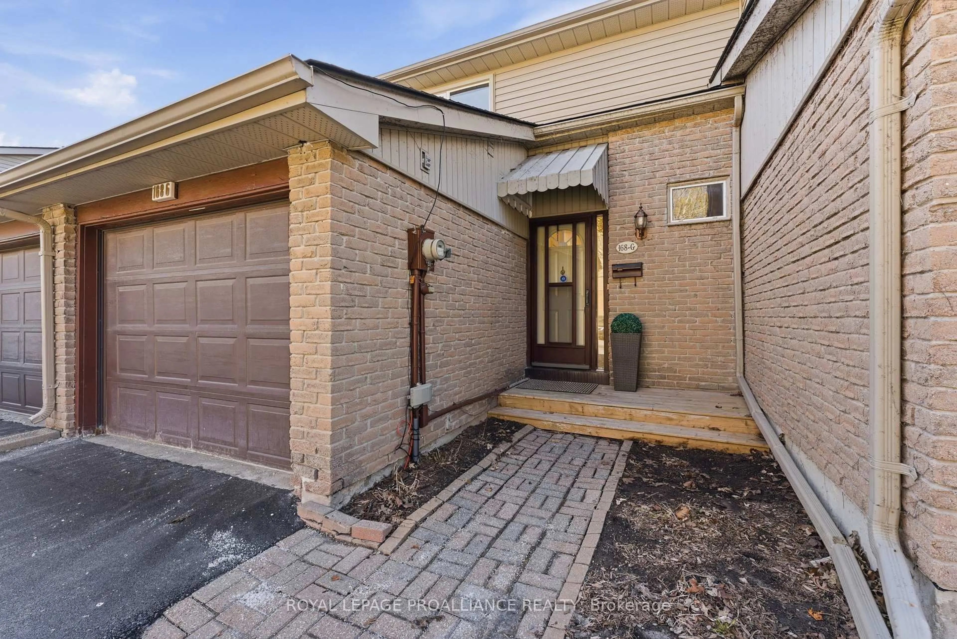 Home with brick exterior material, street for 168G Singleton Dr #G, Belleville Ontario K8N 5H4