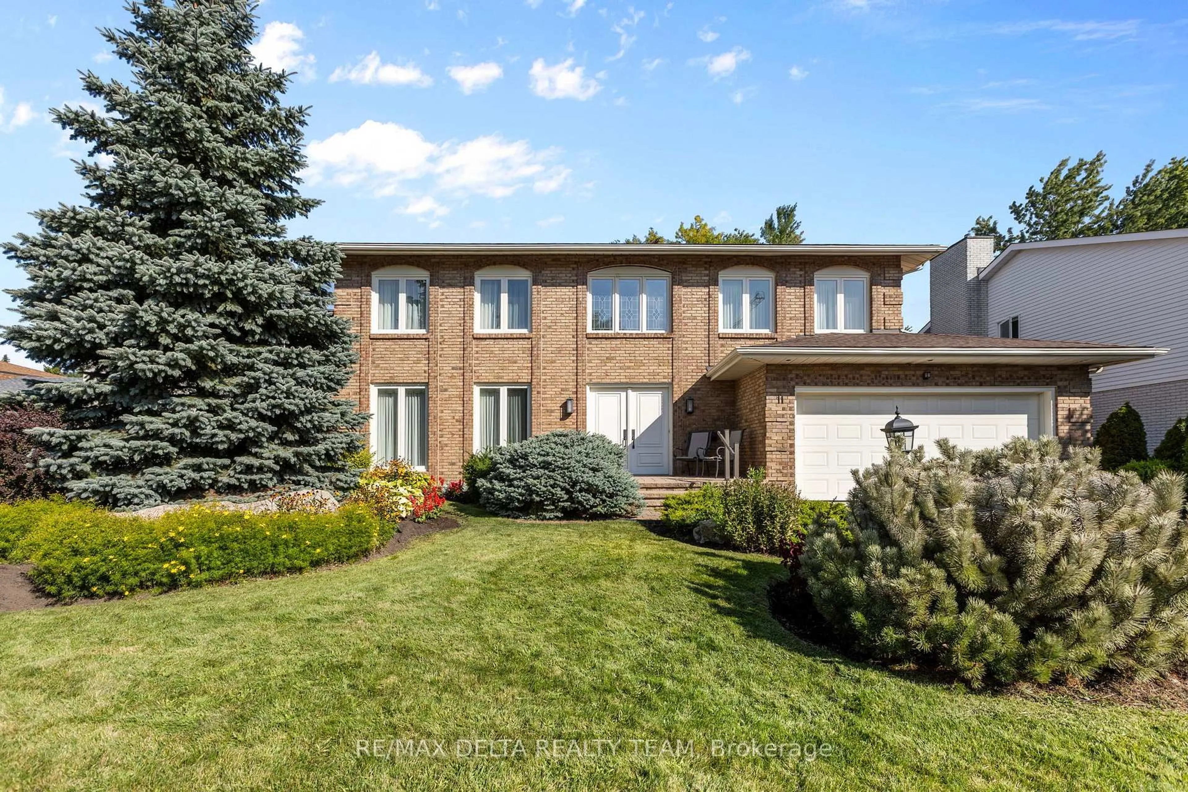 Home with brick exterior material, street for 11 Garand Pl, Ottawa Ontario K1H 8M1