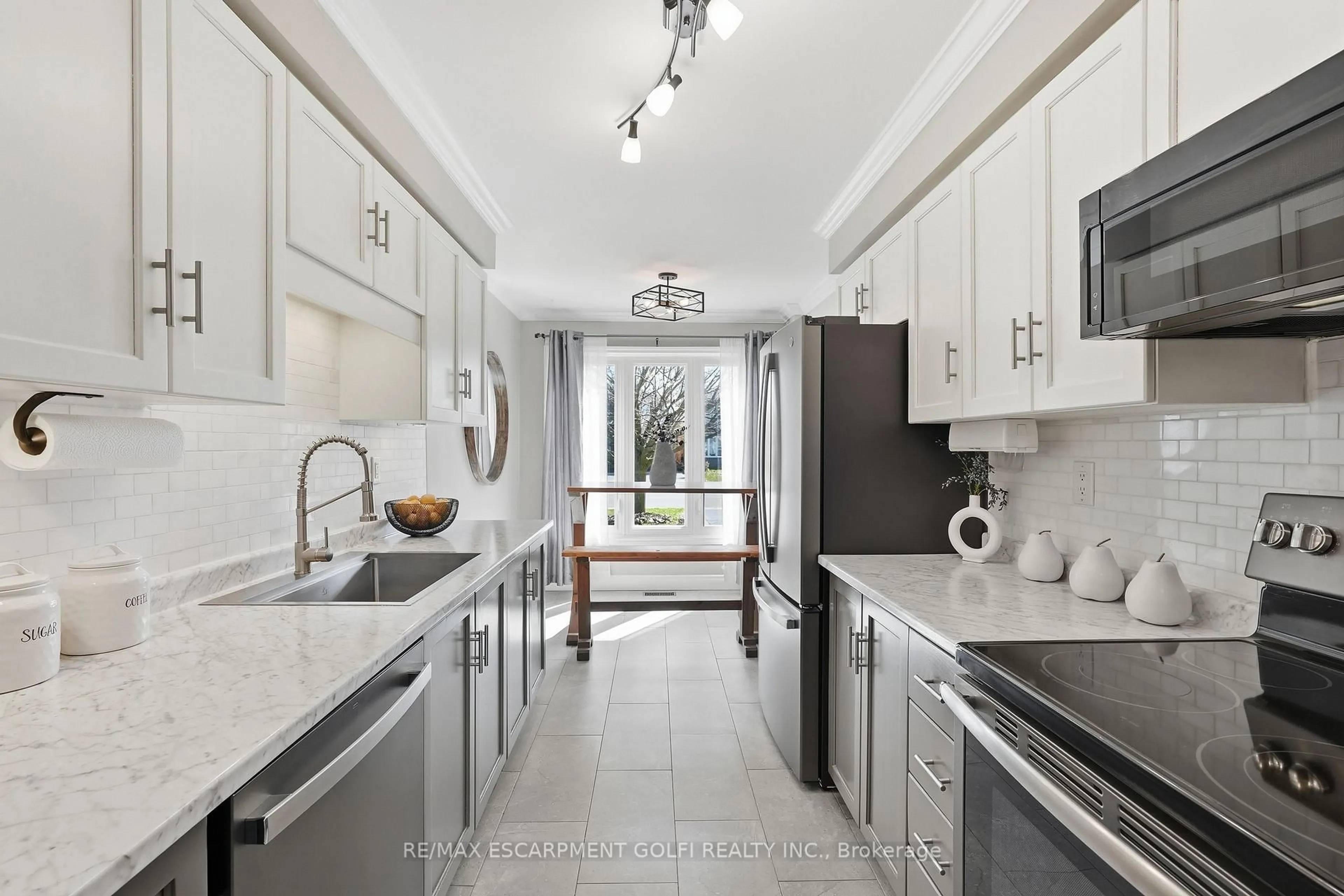 Contemporary kitchen, ceramic/tile floor for 107 Broughton Ave, Hamilton Ontario L8W 3S7