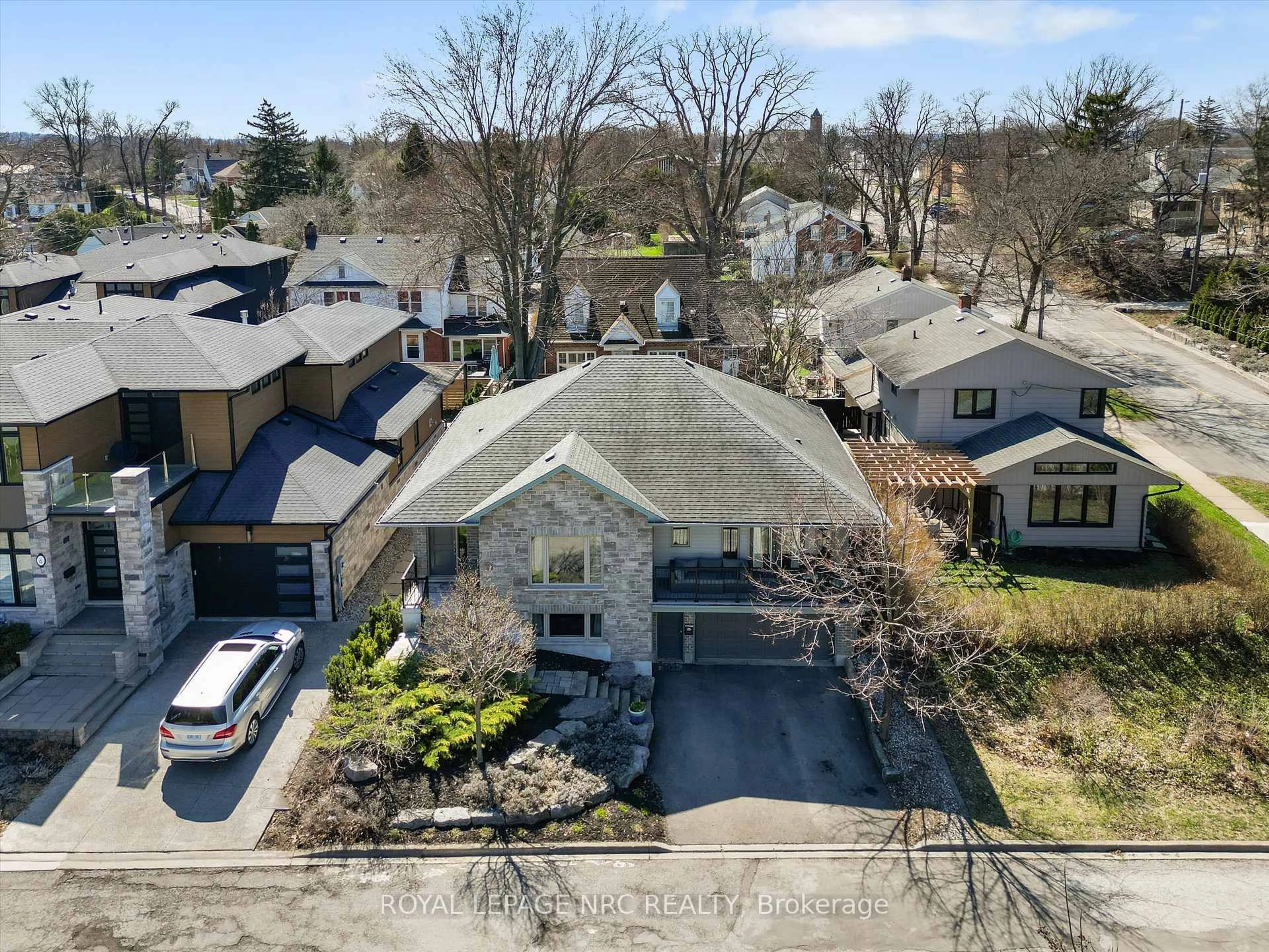 A pic from outside/outdoor area/front of a property/back of a property/a pic from drone, street for 4 Rodman Hall Dr, St. Catharines Ontario L2S 1P2