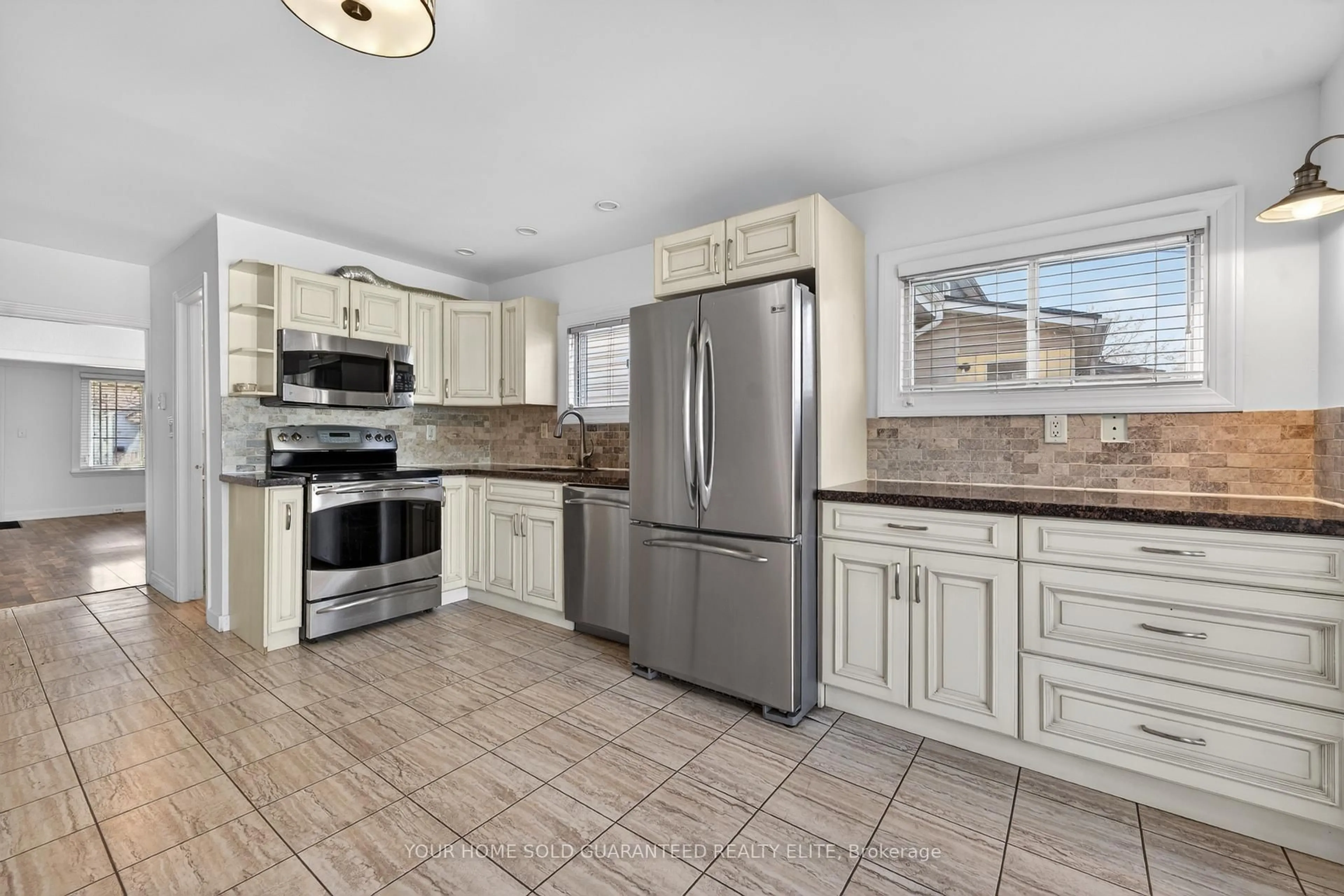 Open concept kitchen, ceramic/tile floor for 183 Paling Ave, Hamilton Ontario L8H 5J6