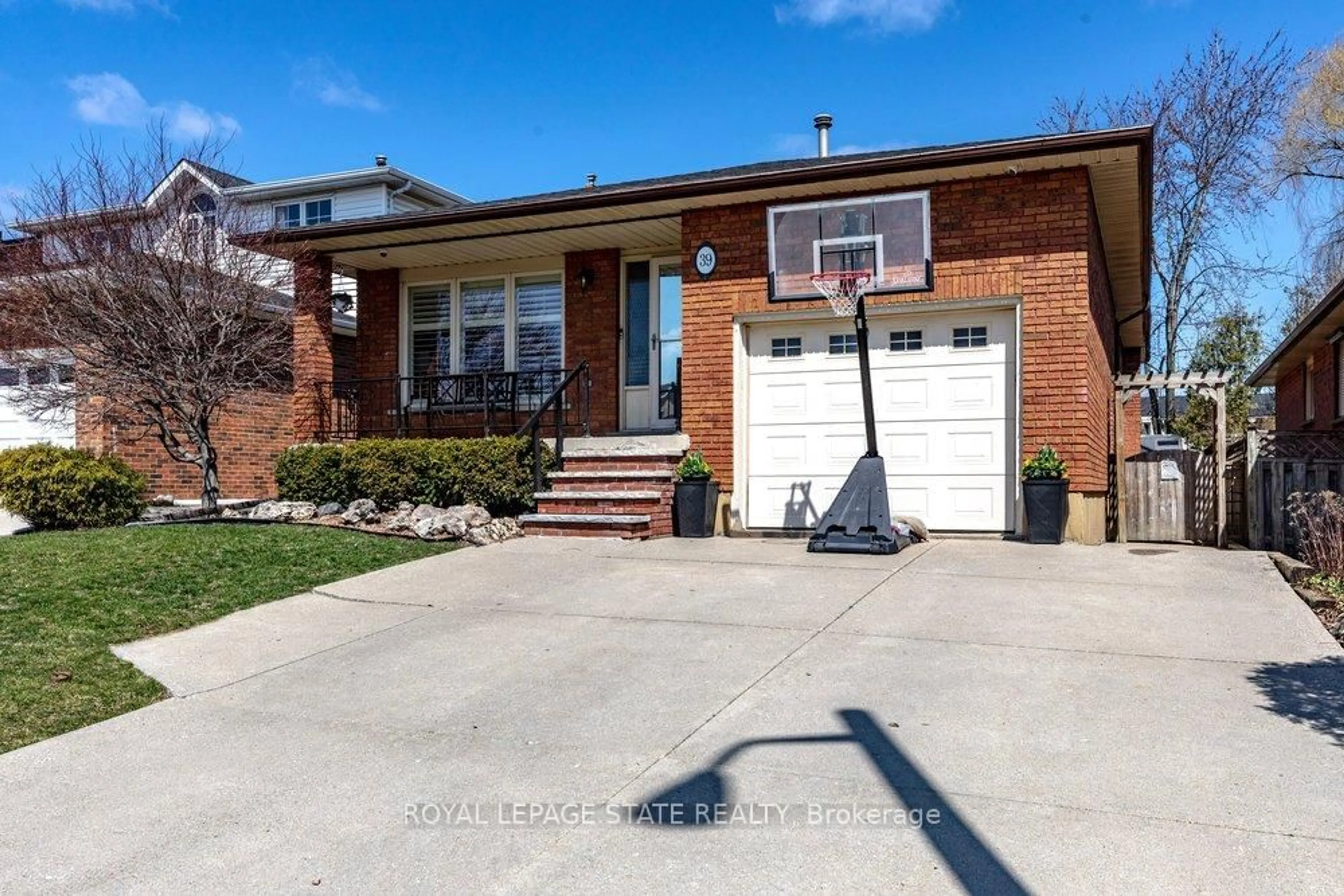 Home with brick exterior material, street for 39 Trenholme Cres, Hamilton Ontario L8W 2L4