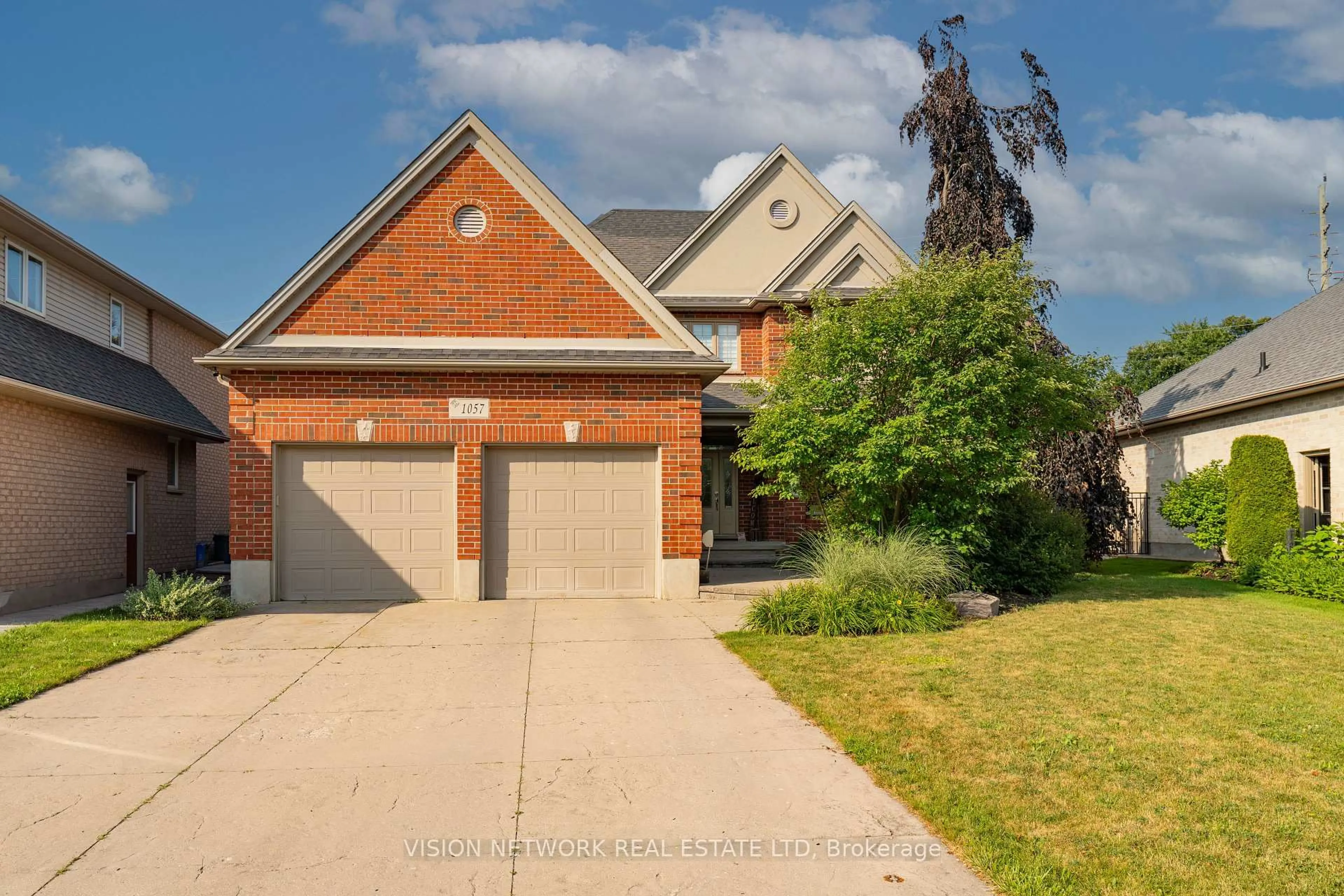 Home with brick exterior material, street for 1057 Manchester Rd, London North Ontario N6H 5P7