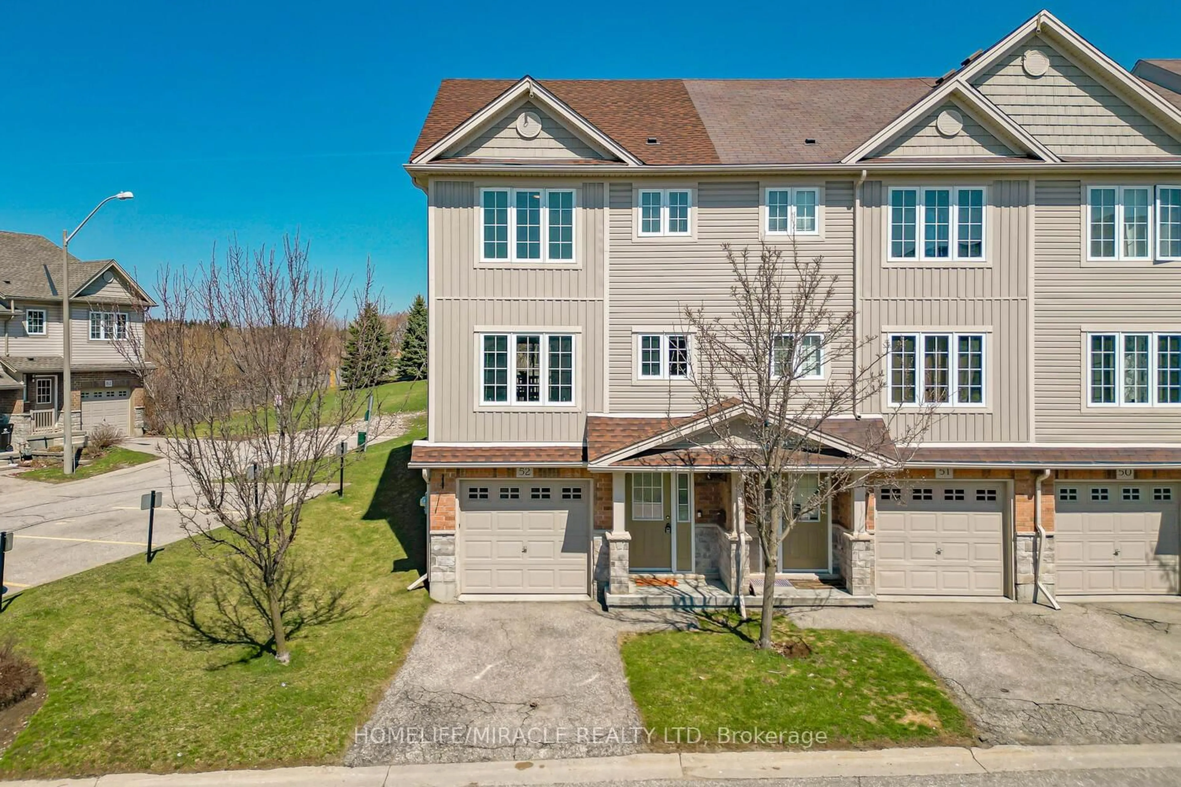 A pic from outside/outdoor area/front of a property/back of a property/a pic from drone, street for 355 Fisher Mills Rd #52, Cambridge Ontario N3C 4N5