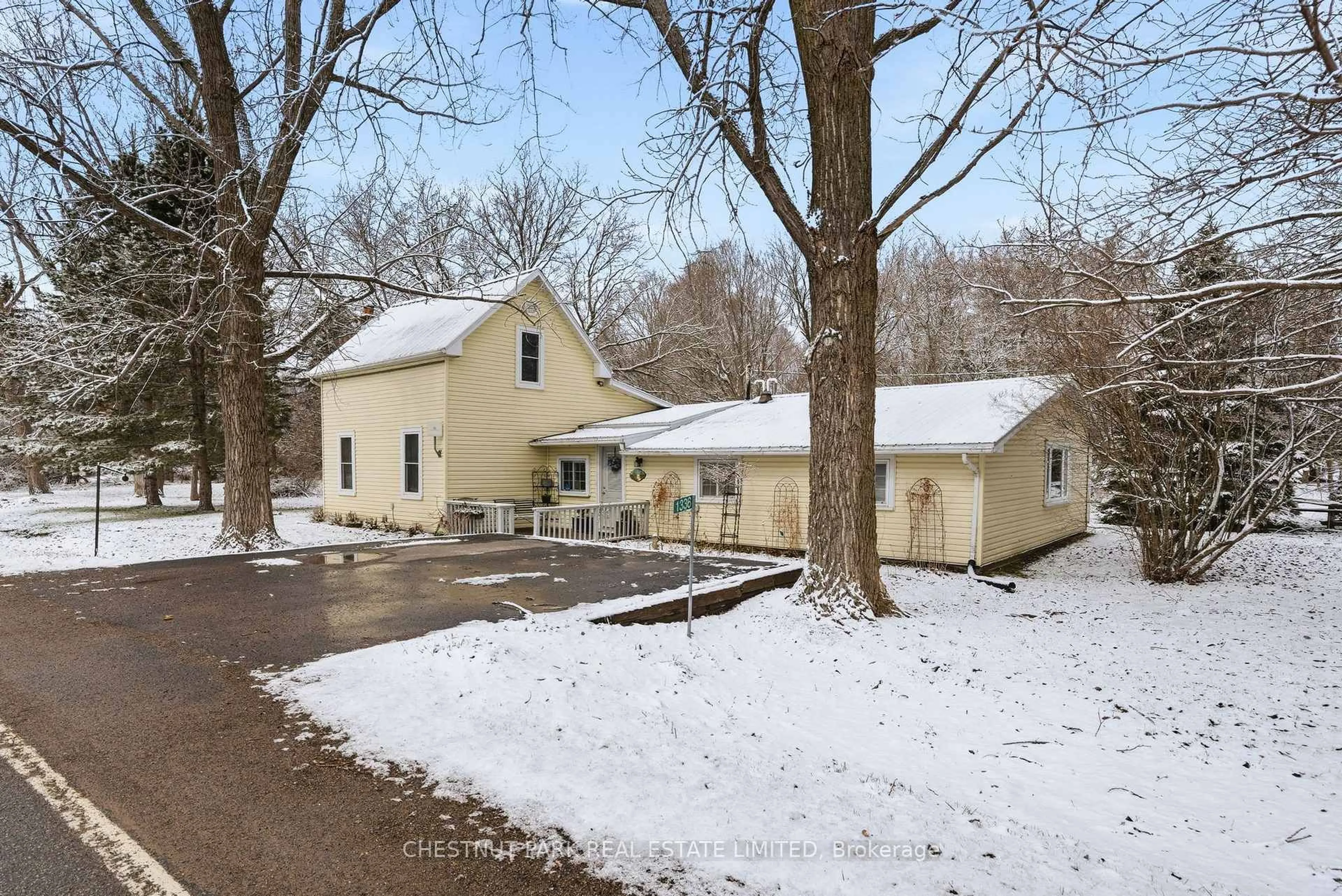 A pic from outside/outdoor area/front of a property/back of a property/a pic from drone, street for 1336 County Rd 11, Prince Edward County Ontario K0K 2T0