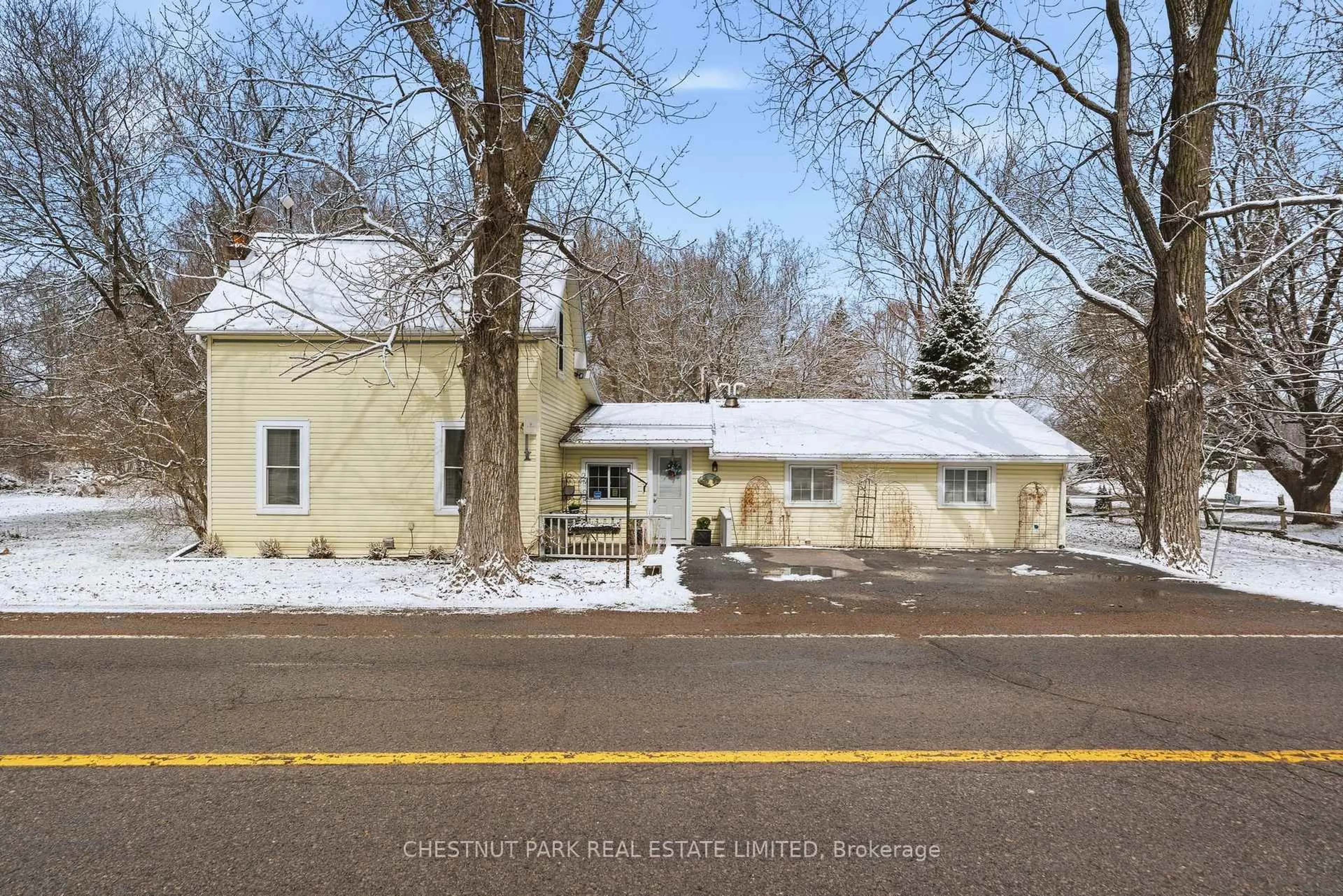 A pic from outside/outdoor area/front of a property/back of a property/a pic from drone, street for 1336 County Rd 11, Prince Edward County Ontario K0K 2T0