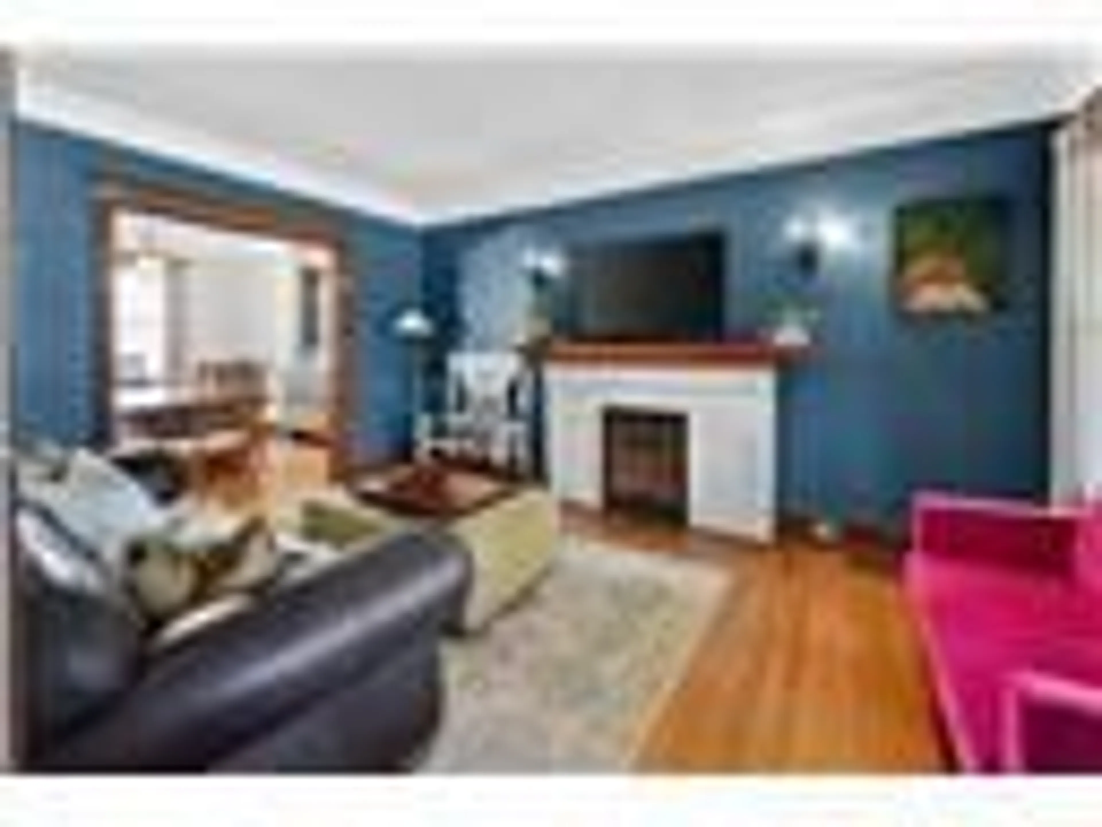 Living room with furniture, wood/laminate floor for 207 EDGEMONT St, Hamilton Ontario L8K 2J1