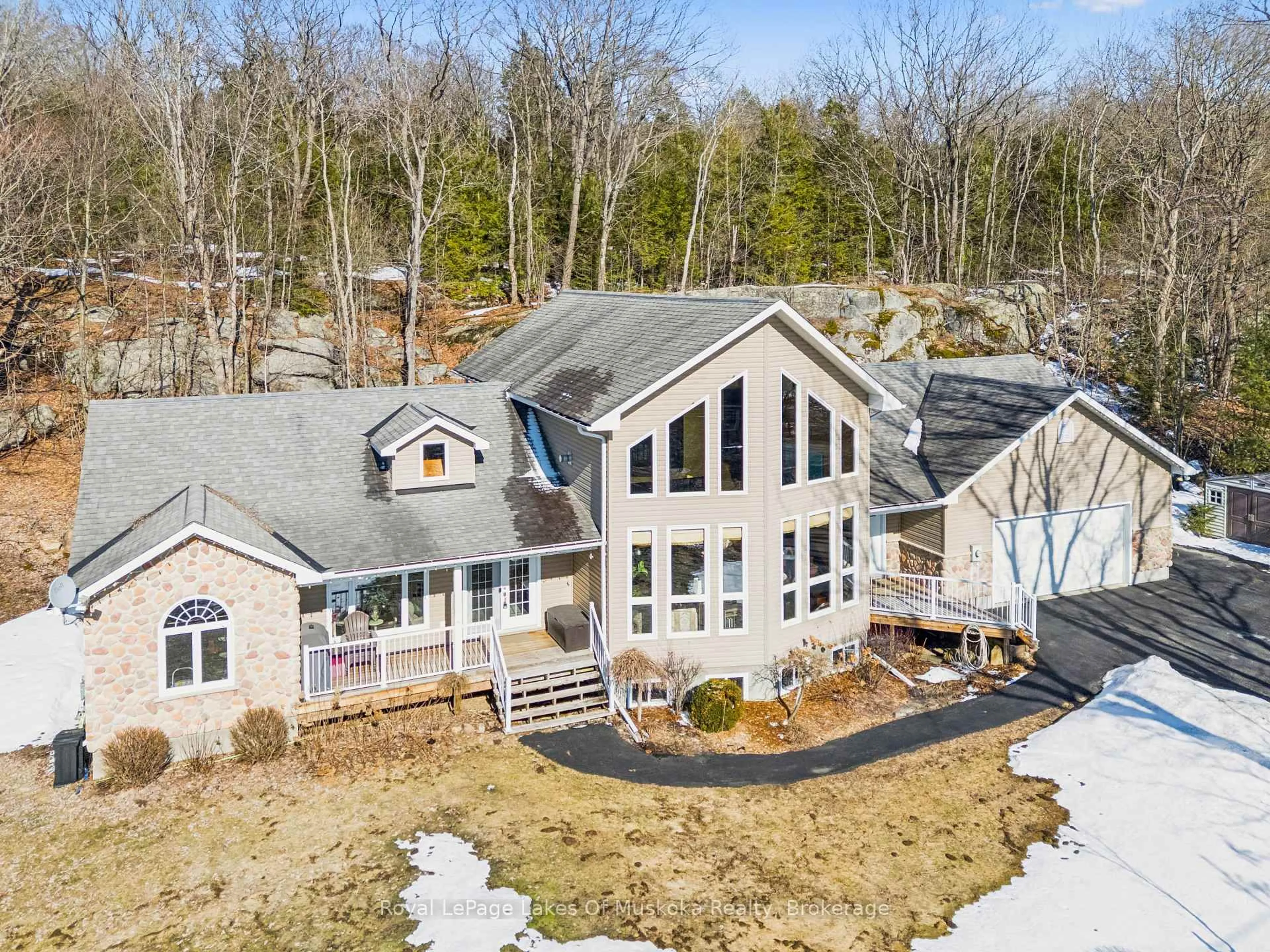 A pic from outside/outdoor area/front of a property/back of a property/a pic from drone, mountain view for 1441 Cedar Lane, Bracebridge Ontario P1L 1W9