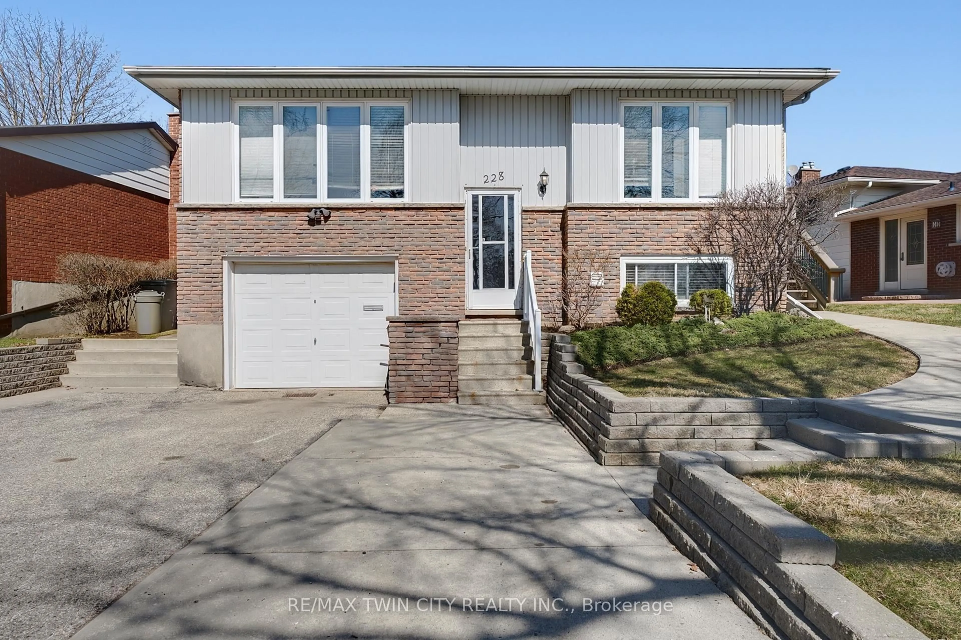 Home with brick exterior material, street for 228 Holborn Dr, Kitchener Ontario N2A 2E8