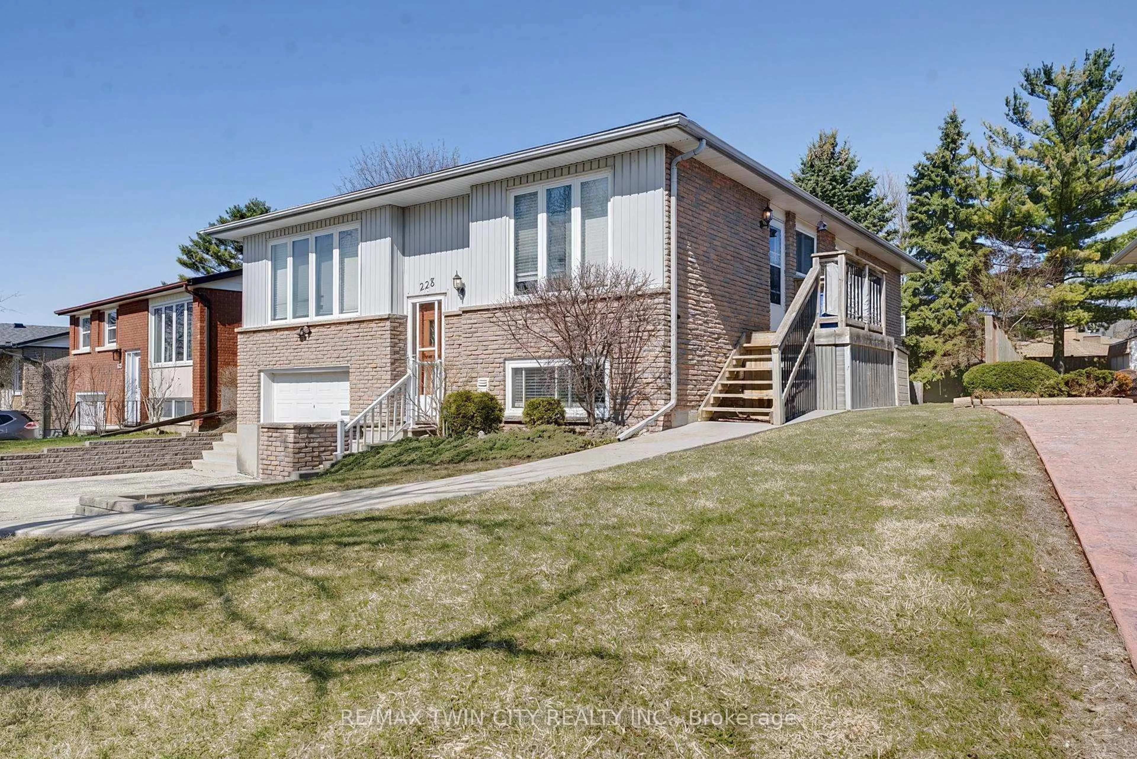 Home with brick exterior material, street for 228 Holborn Dr, Kitchener Ontario N2A 2E8
