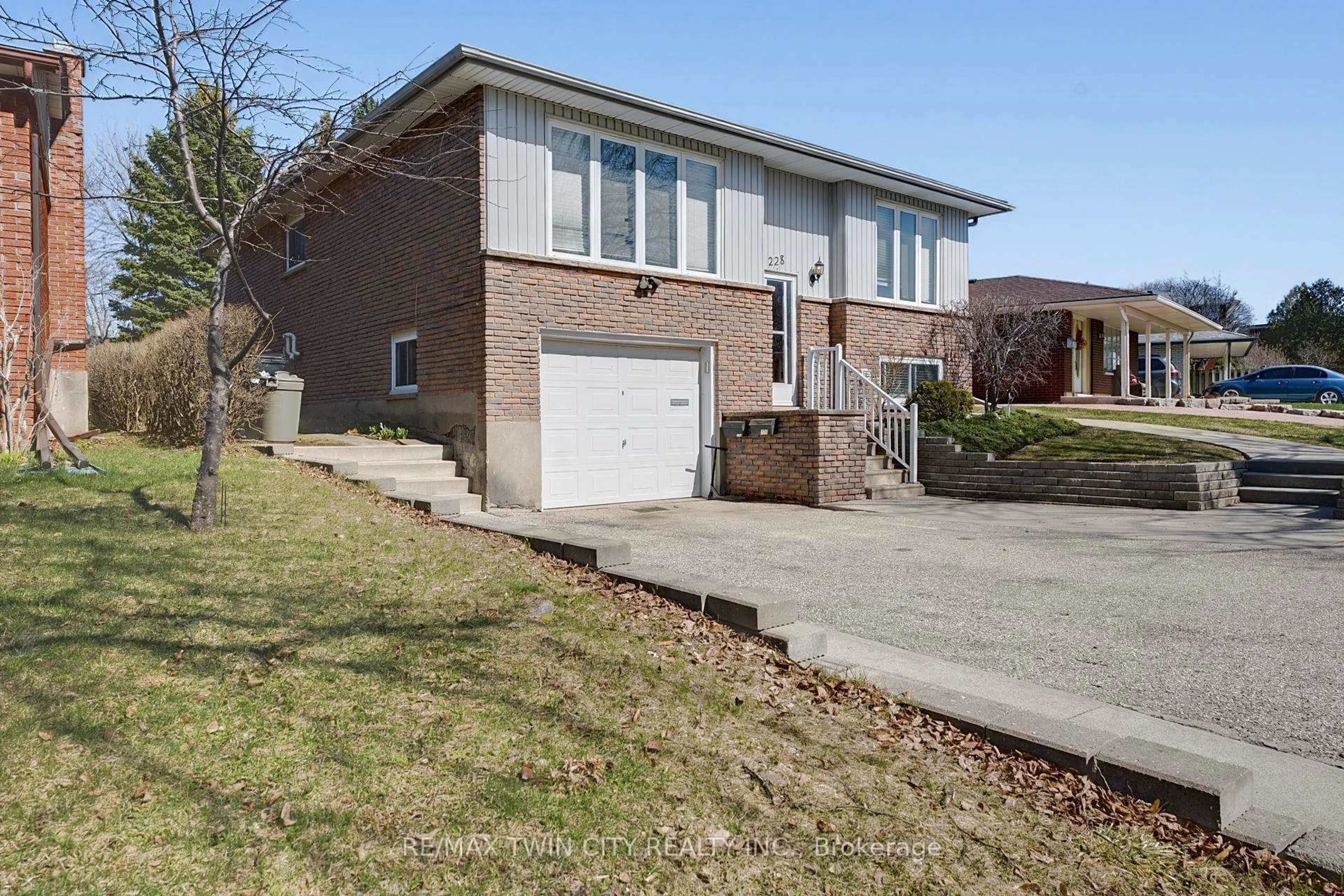 Home with brick exterior material, street for 228 Holborn Dr, Kitchener Ontario N2A 2E8