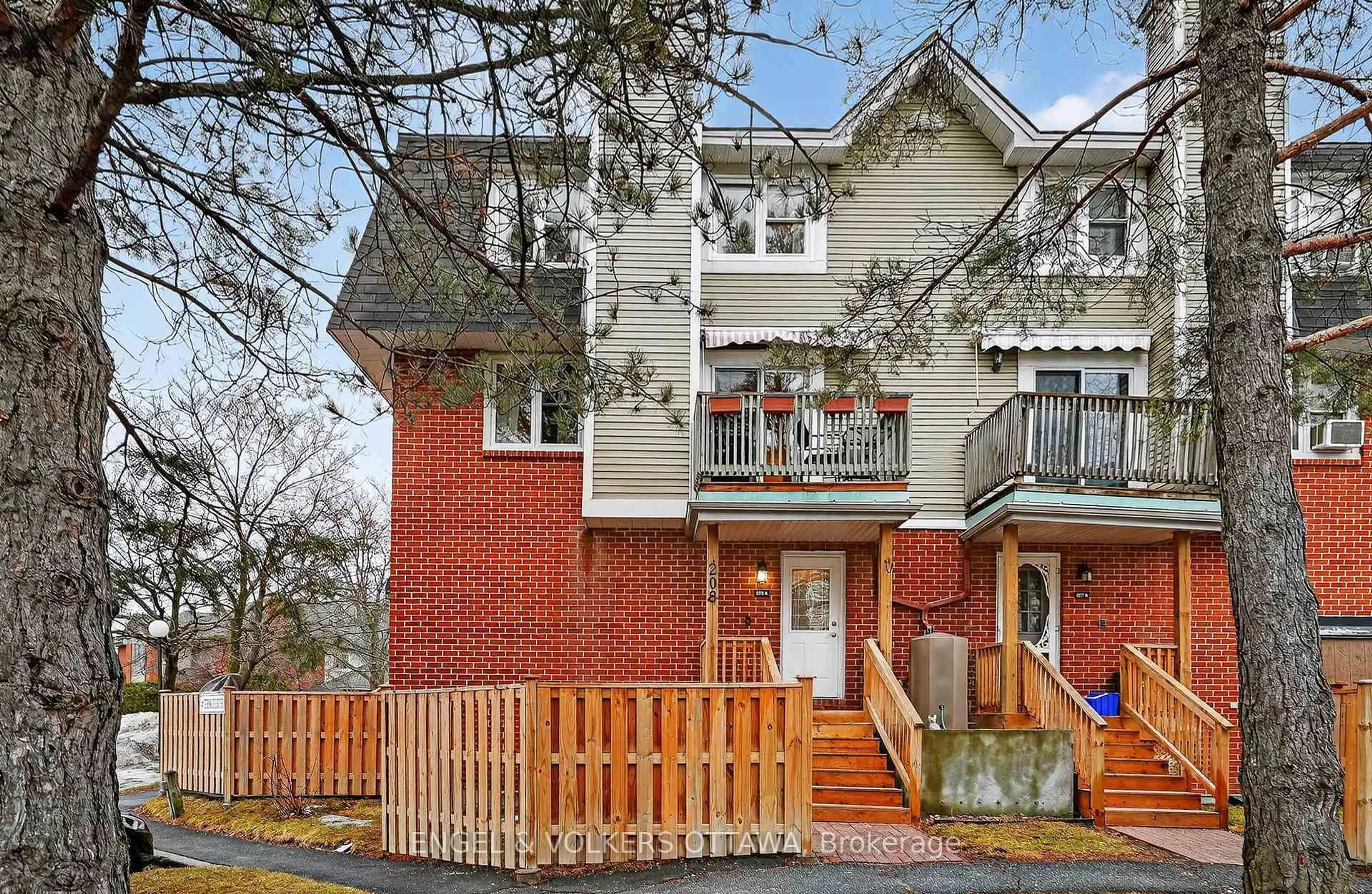 Home with brick exterior material, street for 6 Terrace Dr #208, Ottawa Ontario K2H 9J2