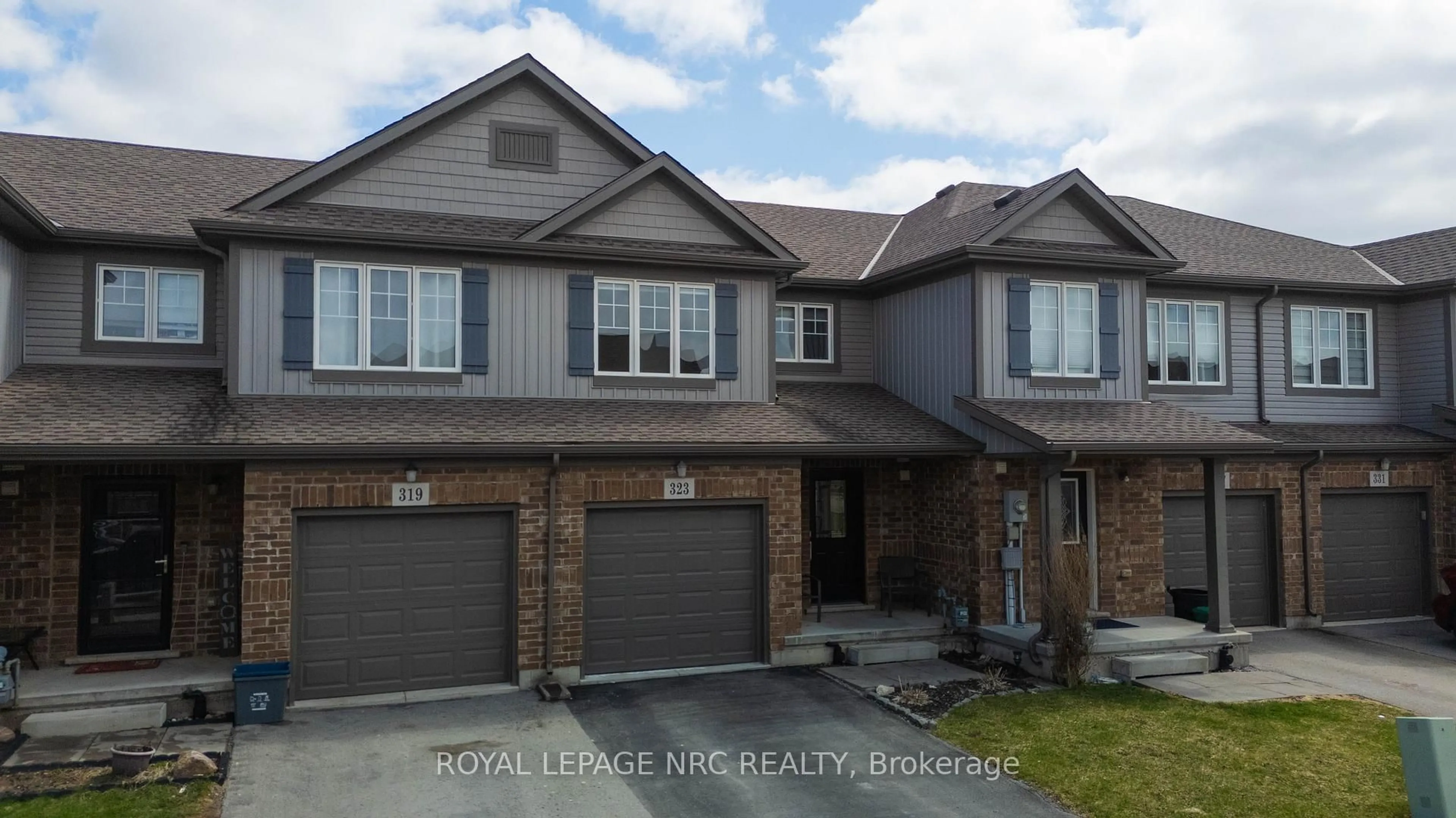 Home with brick exterior material, street for 323 Silverwood Ave, Welland Ontario L3C 0C5