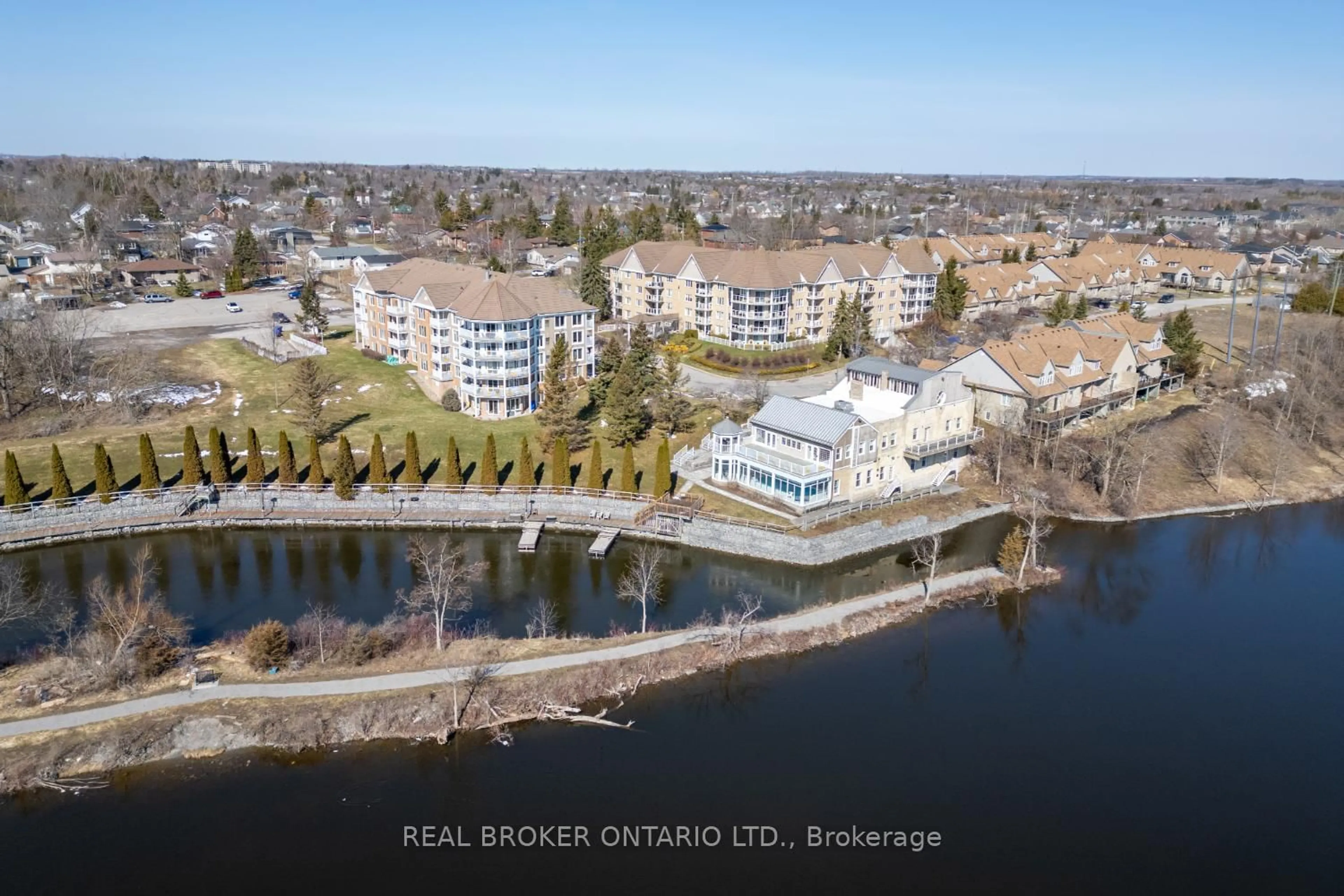 A pic from outside/outdoor area/front of a property/back of a property/a pic from drone, water/lake/river/ocean view for 51 Rivermill Blvd #401, Kawartha Lakes Ontario K9V 6E8