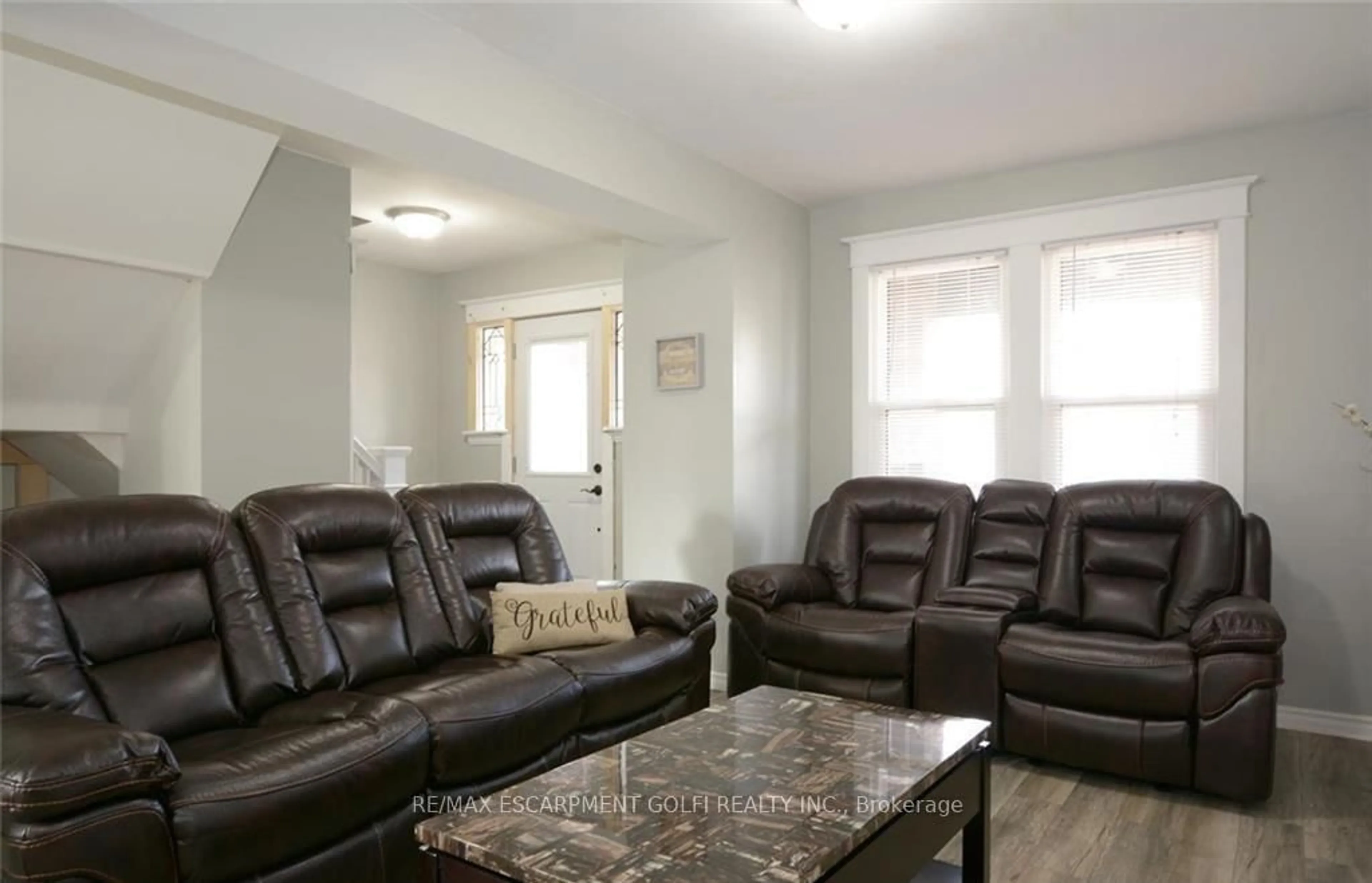 Living room with furniture, unknown for 166 Fairfield Ave, Hamilton Ontario L8H 5H4