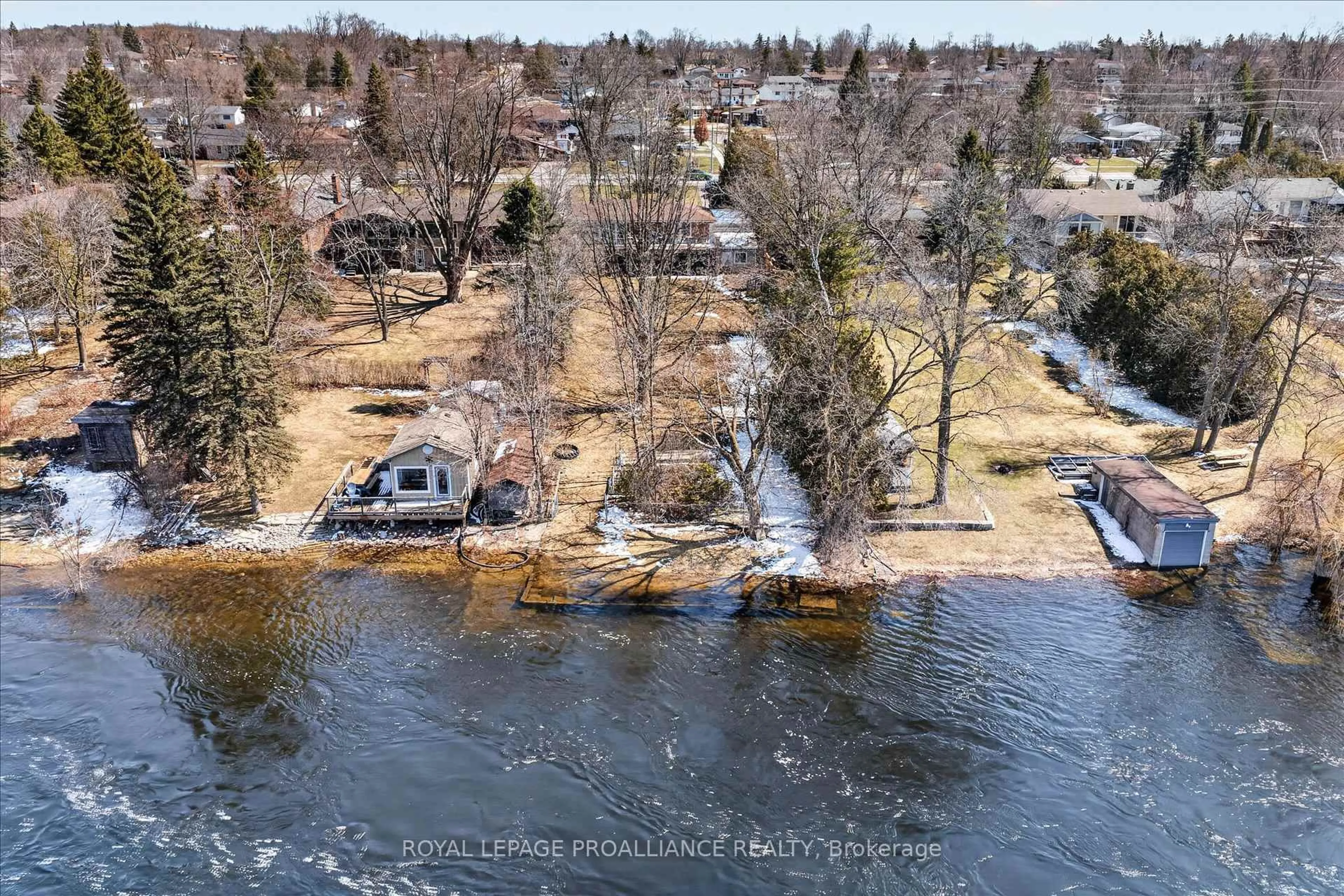 A pic from outside/outdoor area/front of a property/back of a property/a pic from drone, water/lake/river/ocean view for 665 River Rd, Peterborough Ontario K9J 1E6