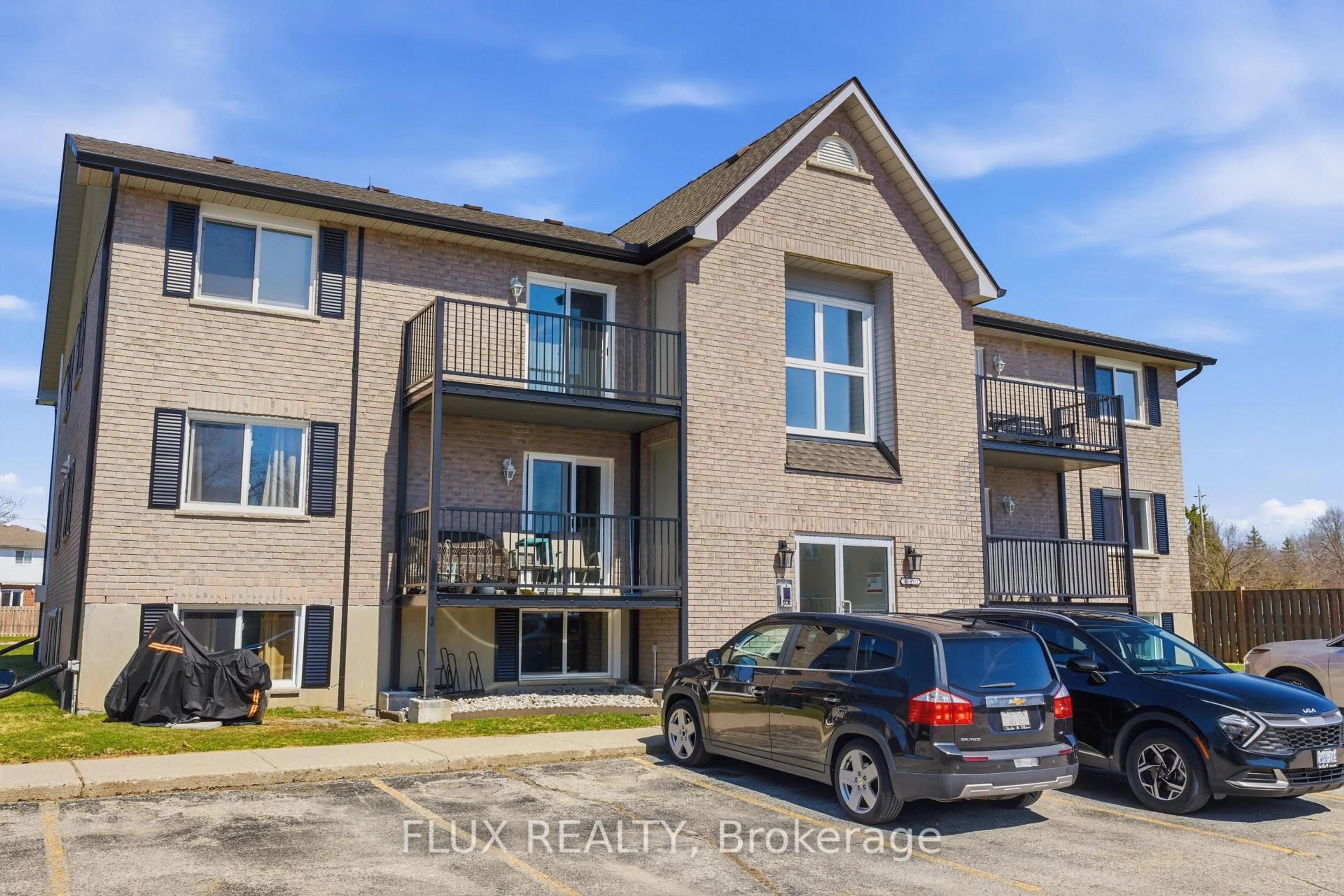 A pic from outside/outdoor area/front of a property/back of a property/a pic from drone, unknown for 50 Campbell Crt #312, Stratford Ontario N5A 7T6