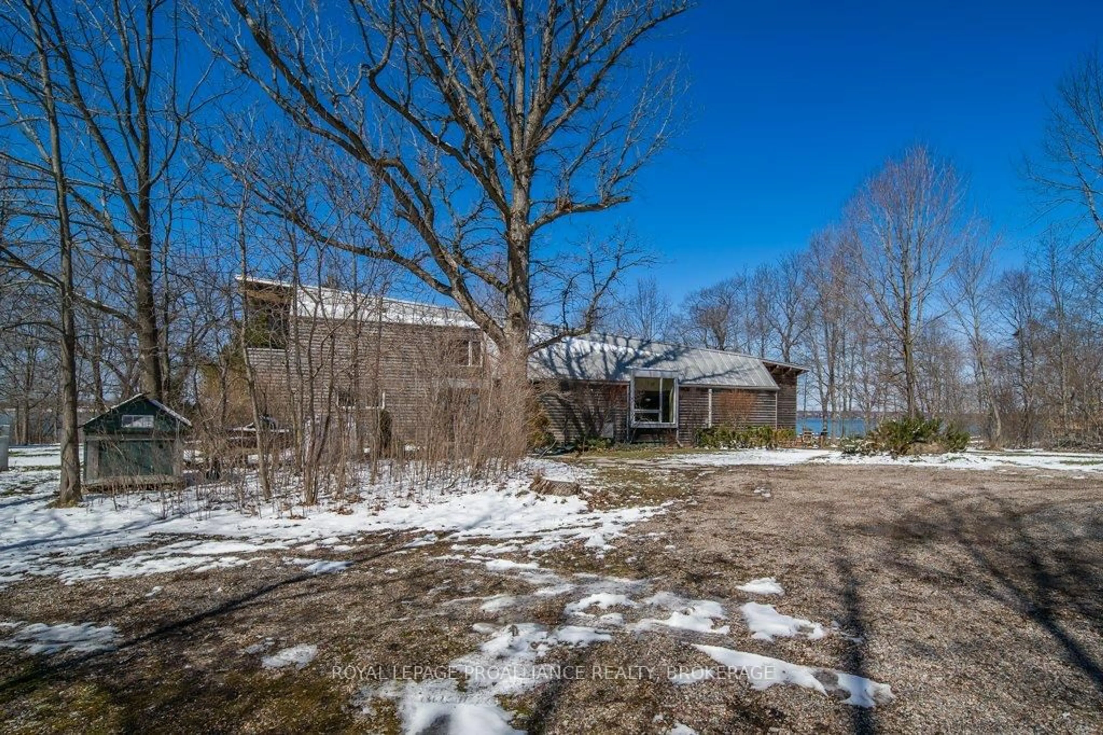 A pic from outside/outdoor area/front of a property/back of a property/a pic from drone, unknown for 97A 12th Line Rd, Wolfe Island Ontario K0H 2Y0