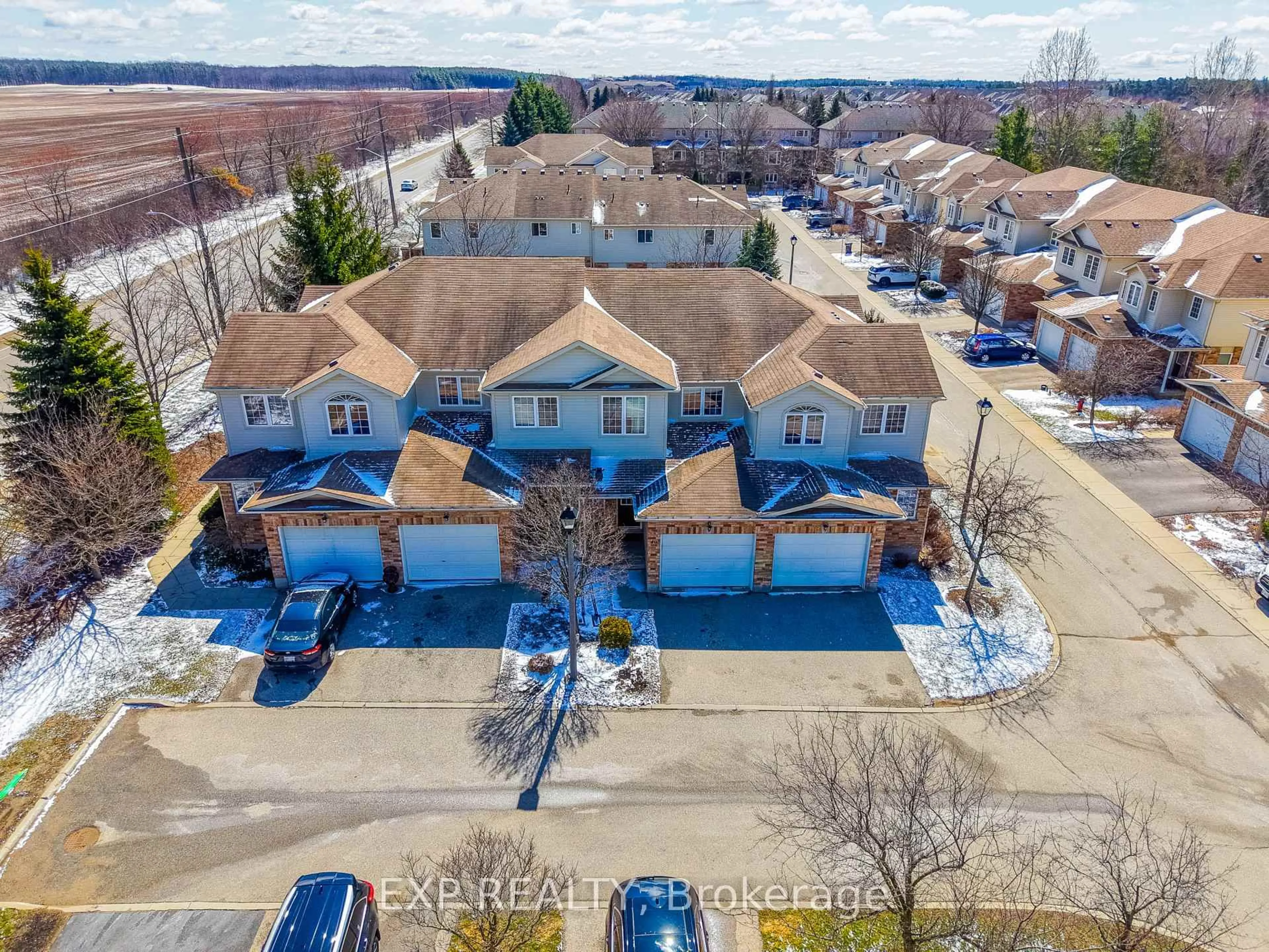 A pic from outside/outdoor area/front of a property/back of a property/a pic from drone, unknown for 105 Bard Blvd #40, Guelph Ontario N1L 0E2