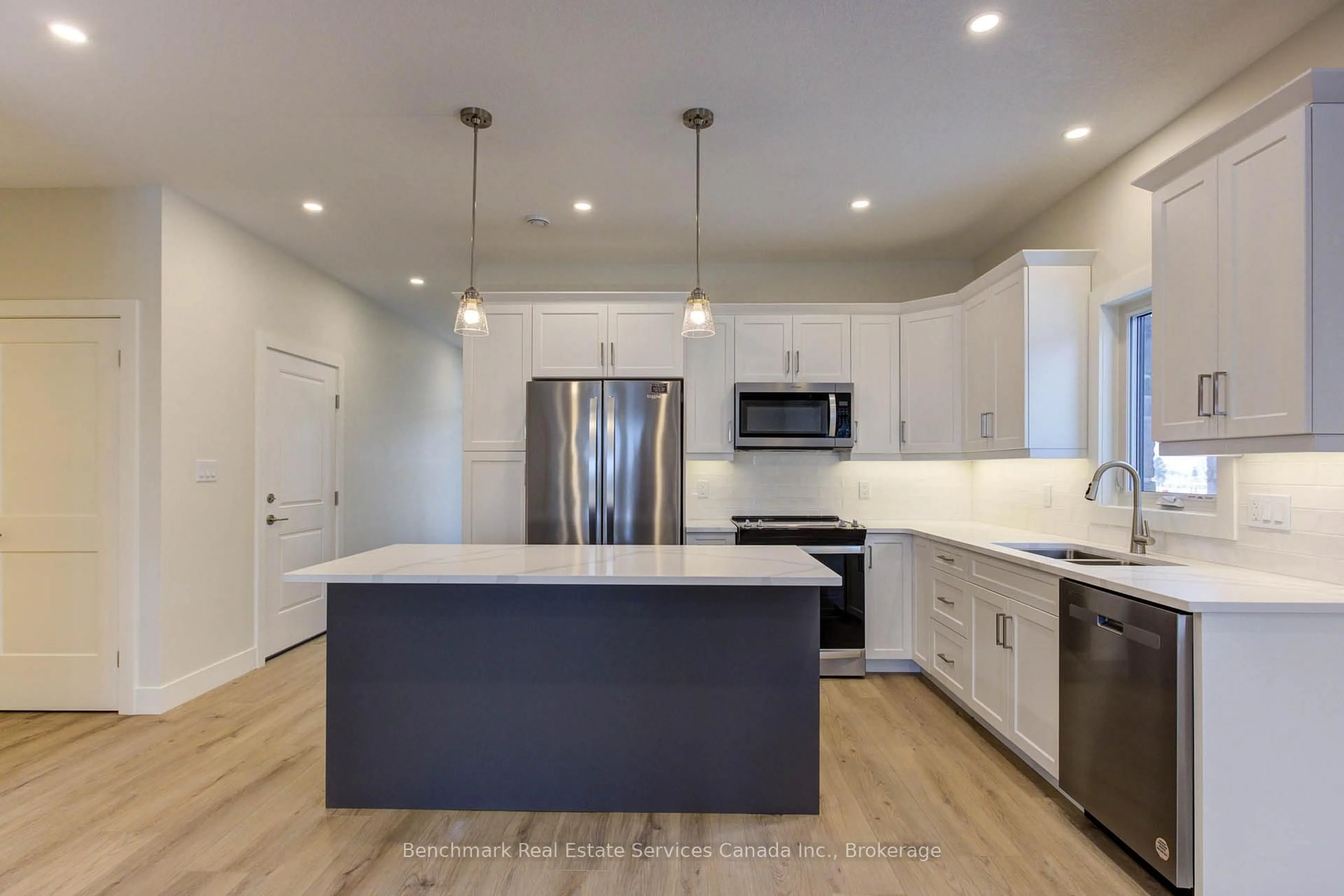 Open concept kitchen, unknown for 63 Cavalier Cres, Huron-Kinloss Ontario N0G 2R0
