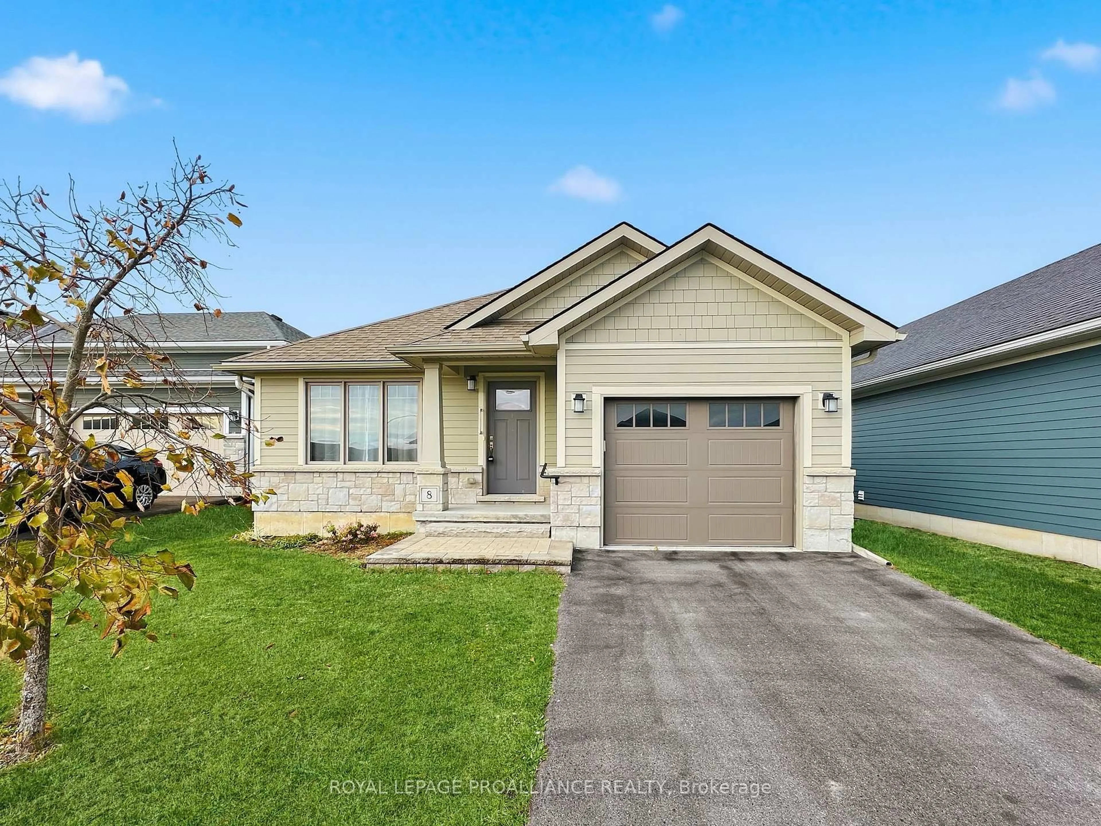 Home with vinyl exterior material, street for 8 Tessa Blvd, Belleville Ontario K8N 4Z5